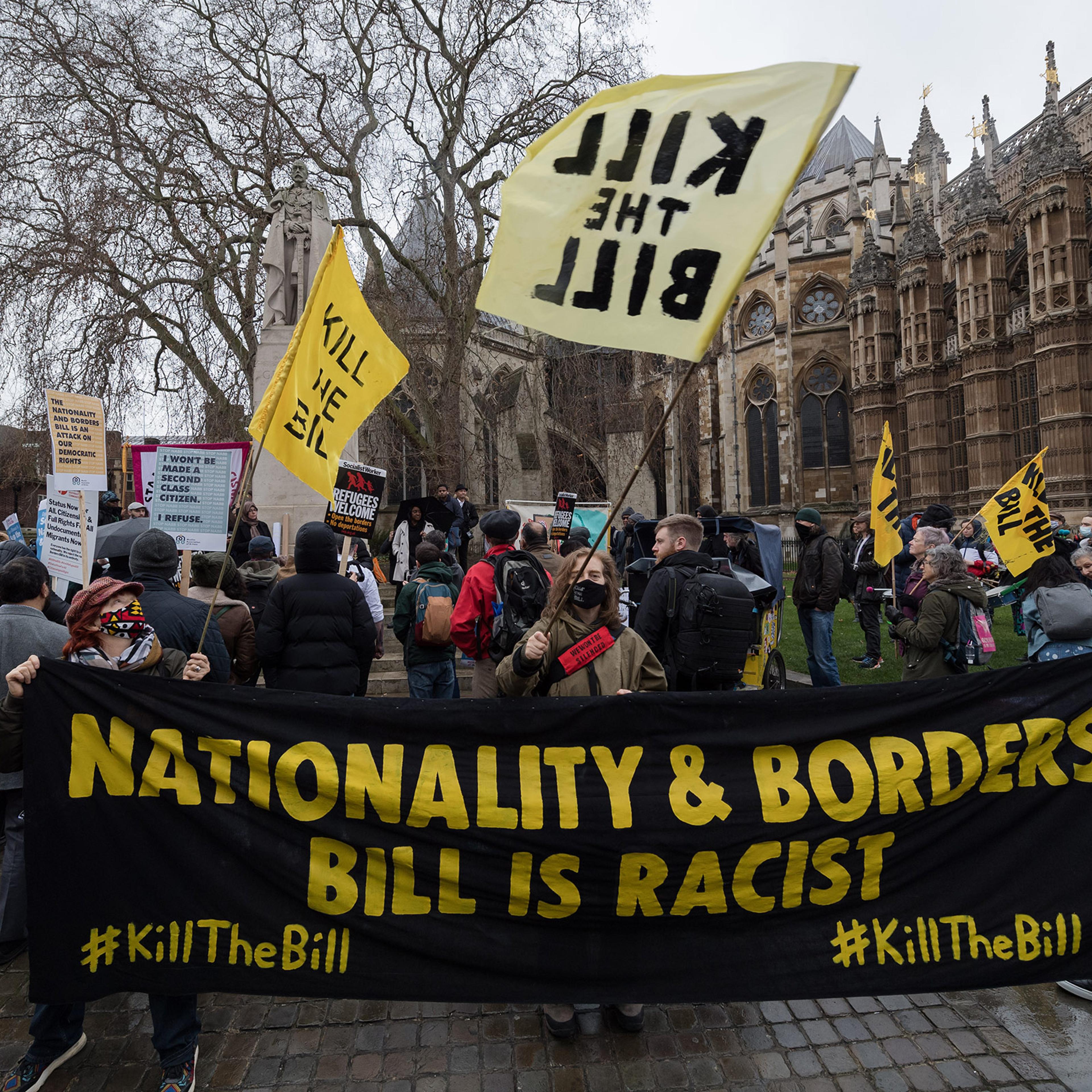 Activists stage a protest outside Houses of Parliament against the Nationality and Borders Bill in London on Jan. 27, 2022.