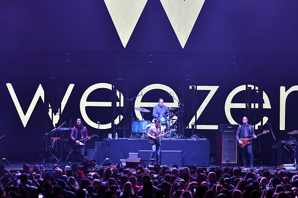 (L-R) Musicians Brian Bell, Patrick Wilson, Rivers Cuomo and Scott Shriner of the band Weezer perform onstage during the iHeartRadio ALTer Ego Show at The Forum on January 19, 2019 in Inglewood, California.