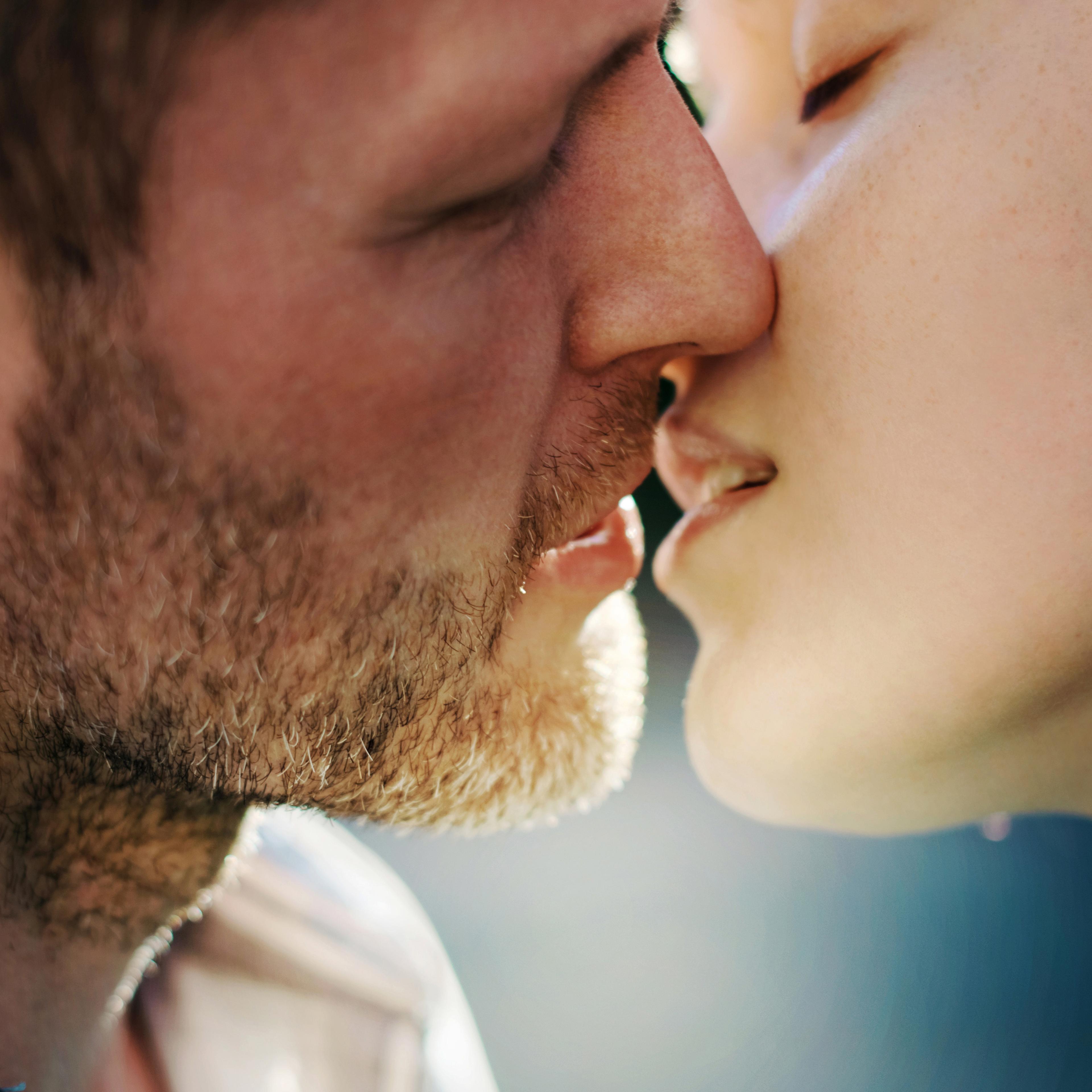 man-woman-kissing