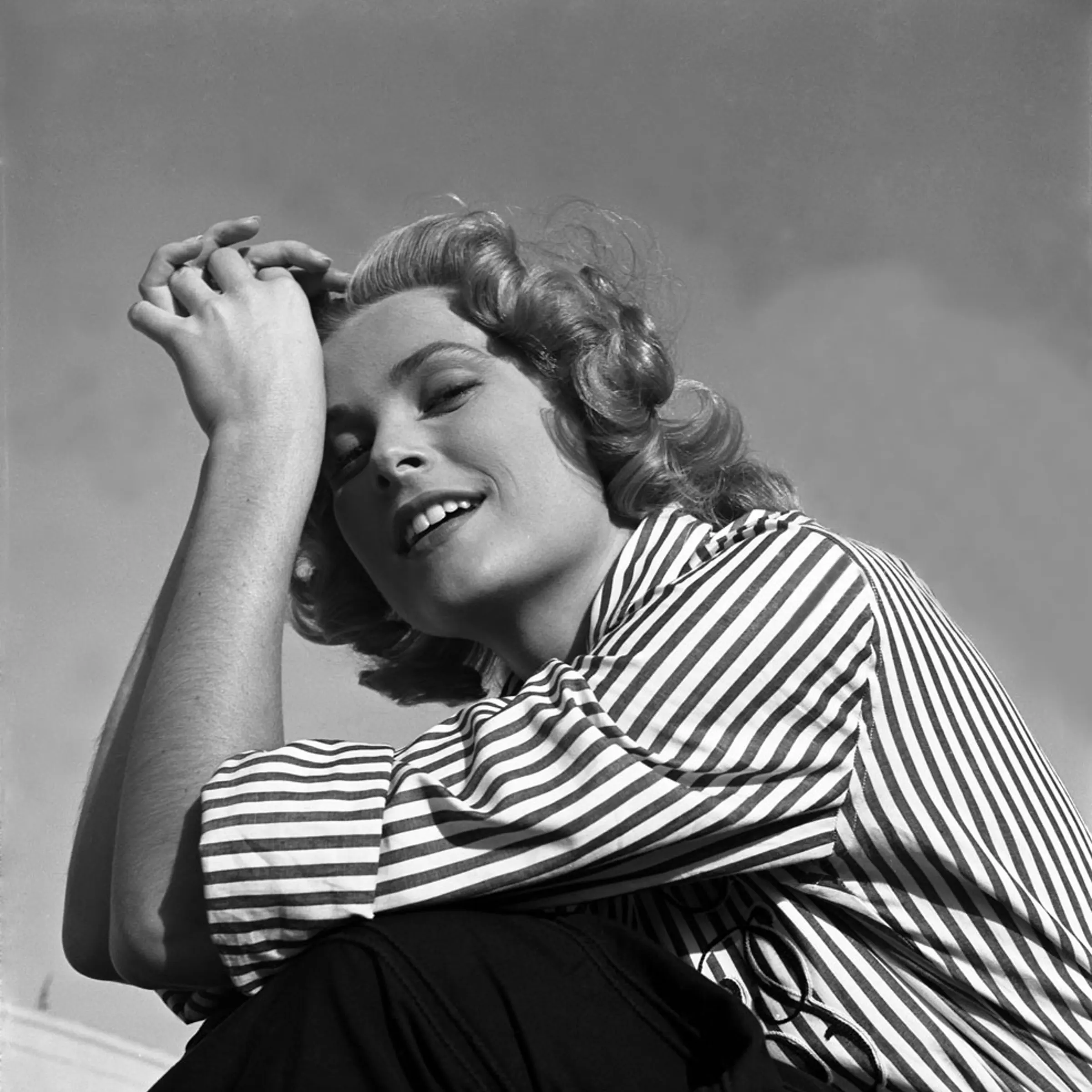 Grace Kelly reveals a sunnier, more casual side, and a hint at her versatility as an actress, 1953.