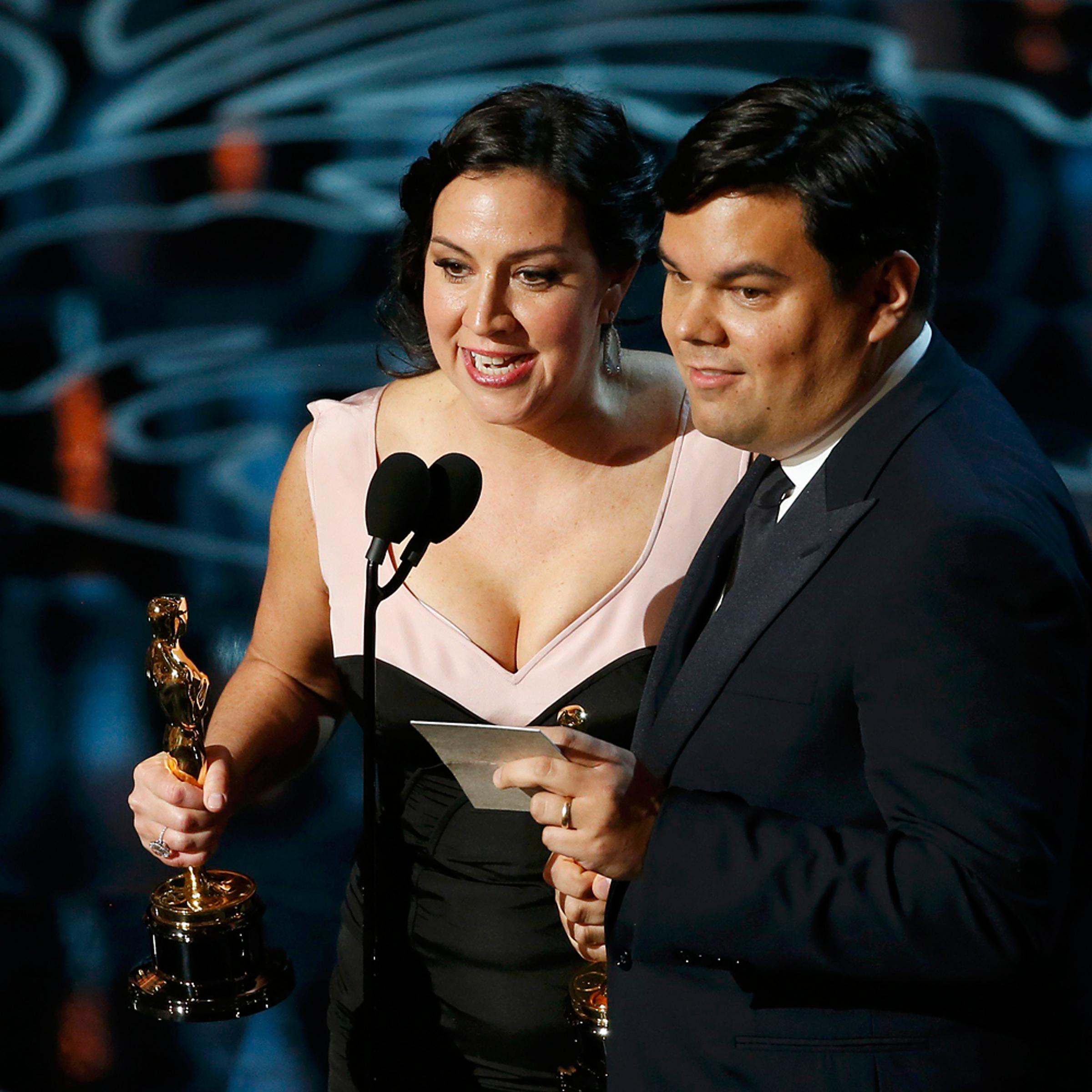 Kristen Anderson-Lopez and Lopez win for their song "Let It Go", best original song for the film "Frozen" at the 86th Academy Awards in Hollywood
