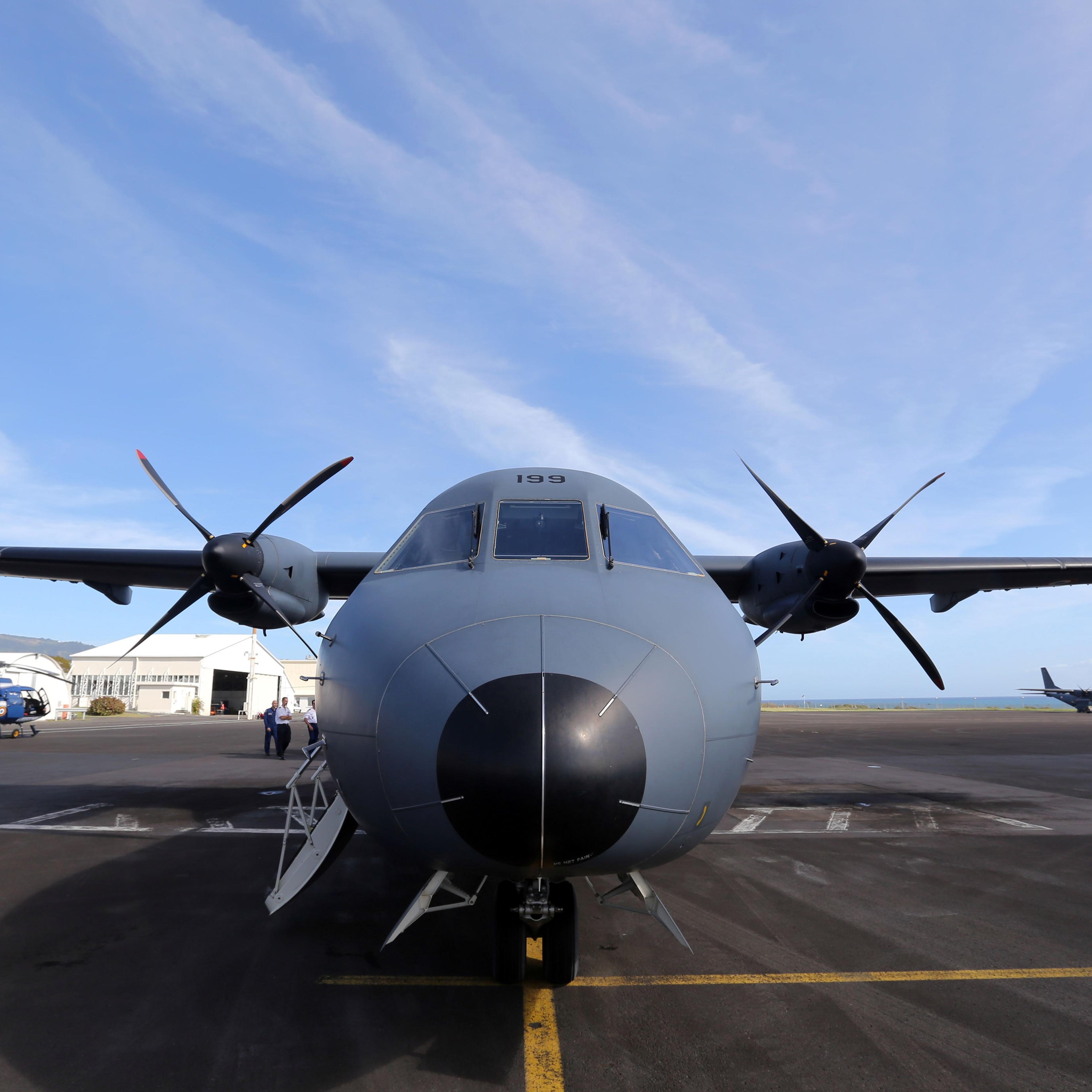 A photo taken on August 14, 2015 shows a CASA 235 plane from the 181st Air Detachment of the French Air Force taking part in the search for wreckage from the missing MH370 plane at an air base in Saint-Marie on the French island of La Reunion .