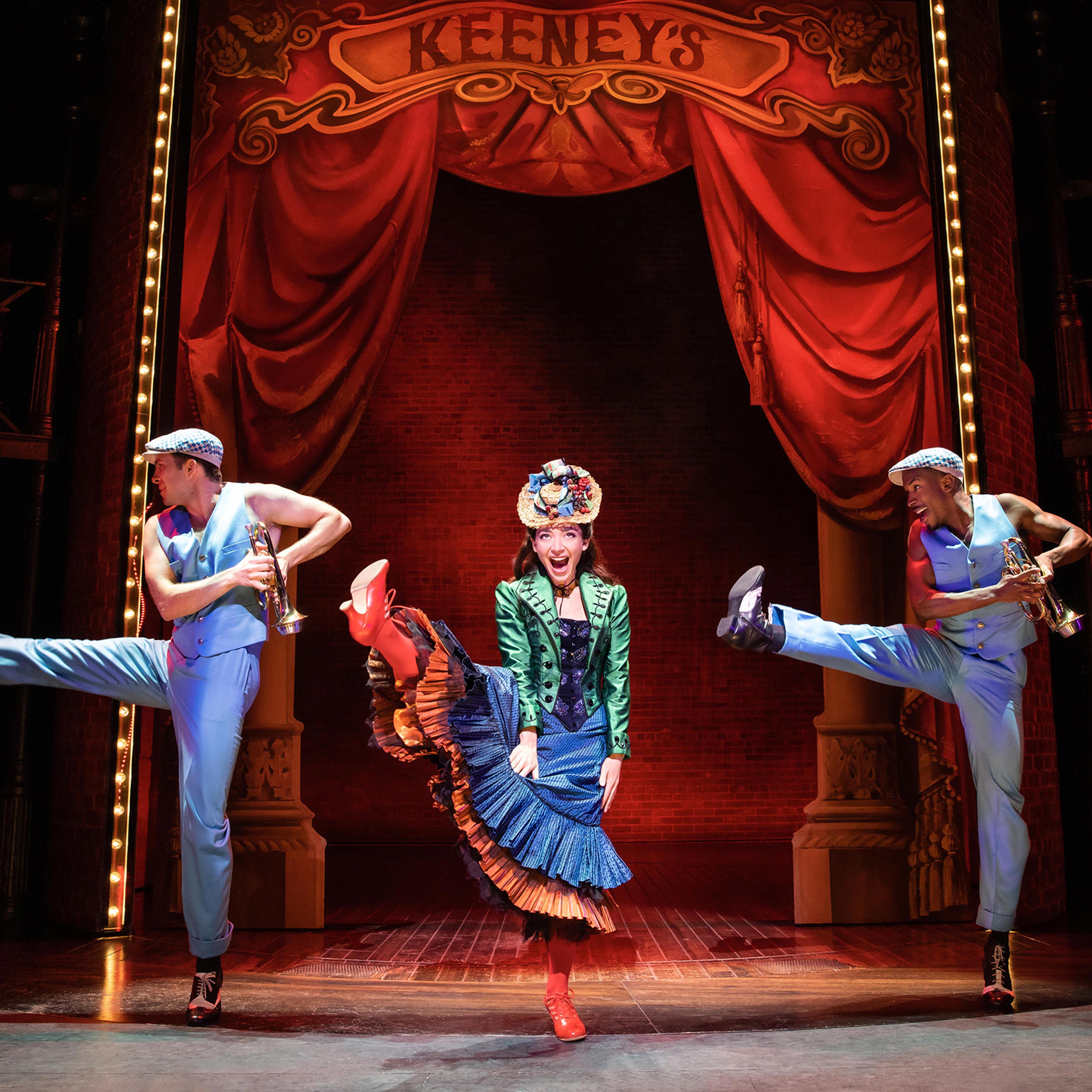 Julie Benko, center, with Kurt Csolak and Justin Prescott in Funny Girl.
