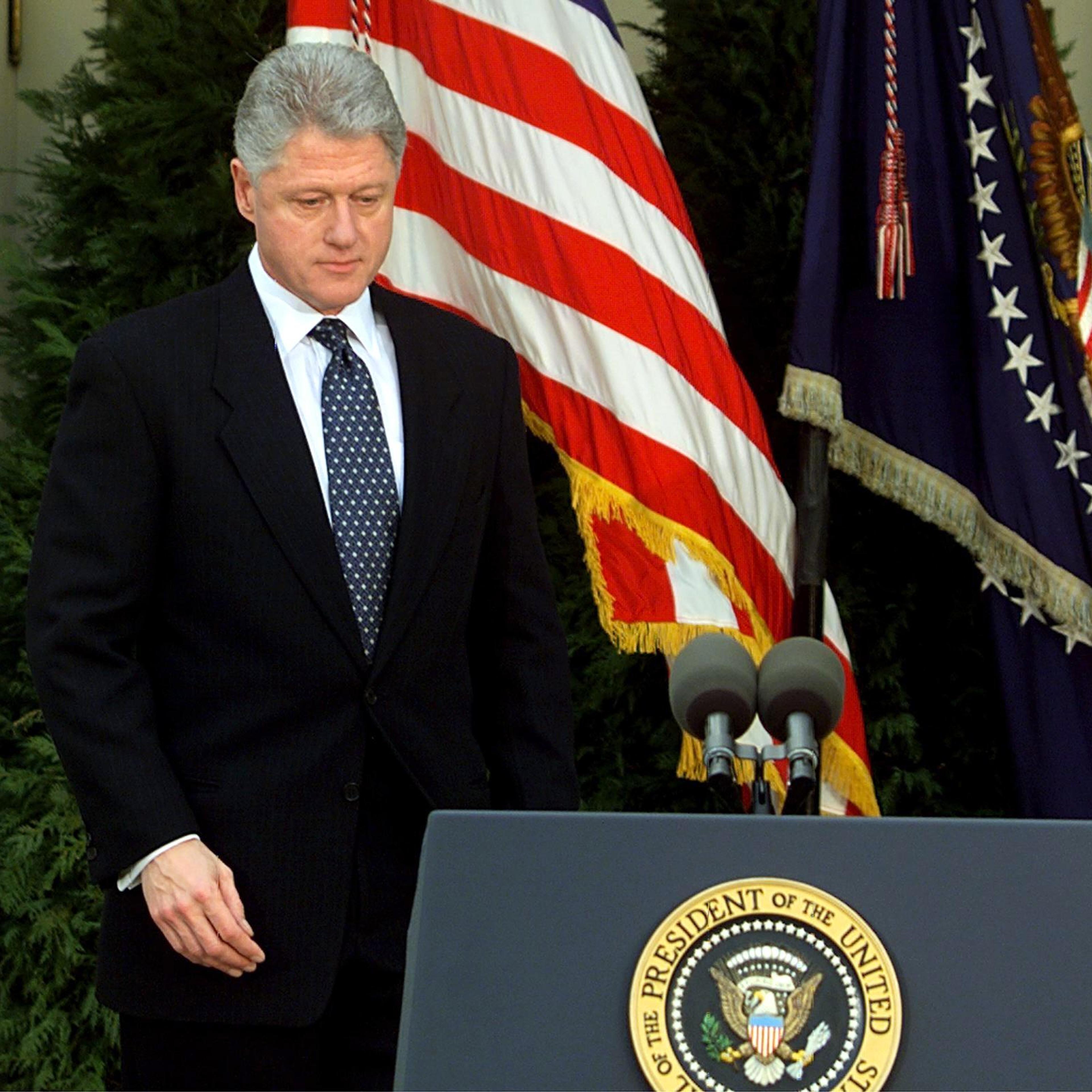 US President Bill Clinton walks to the podium mome
