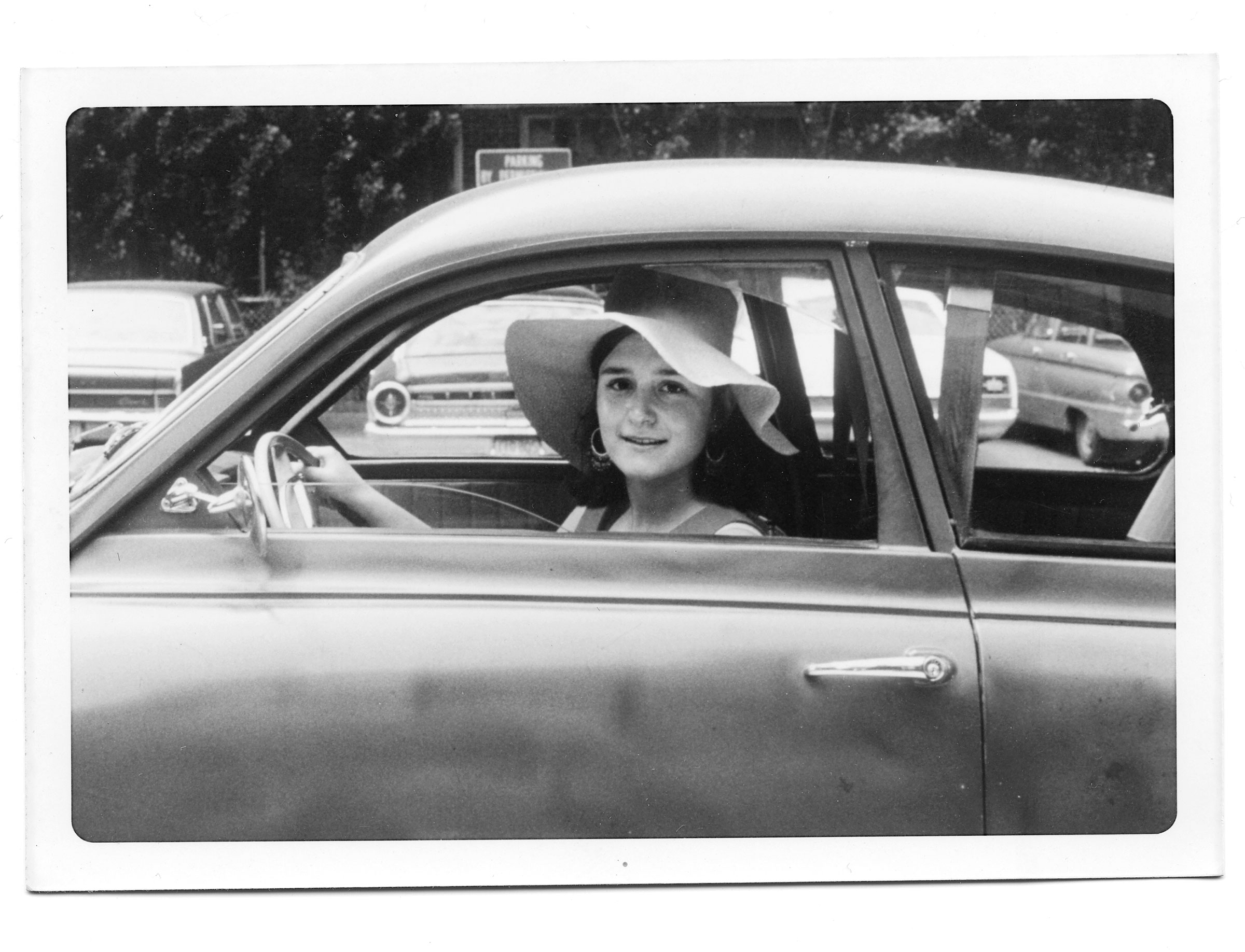 Sherry Turkle in her roadster at Radcliffe College graduation, June 1970