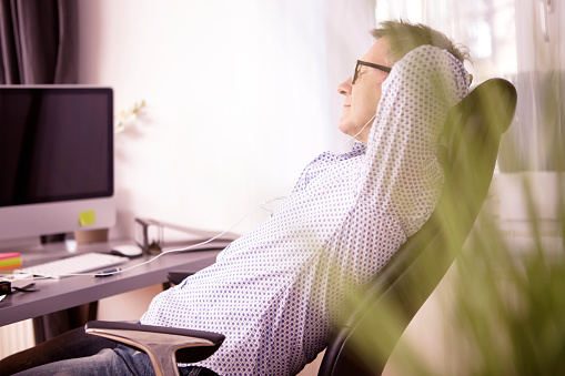 businessman-listening-music