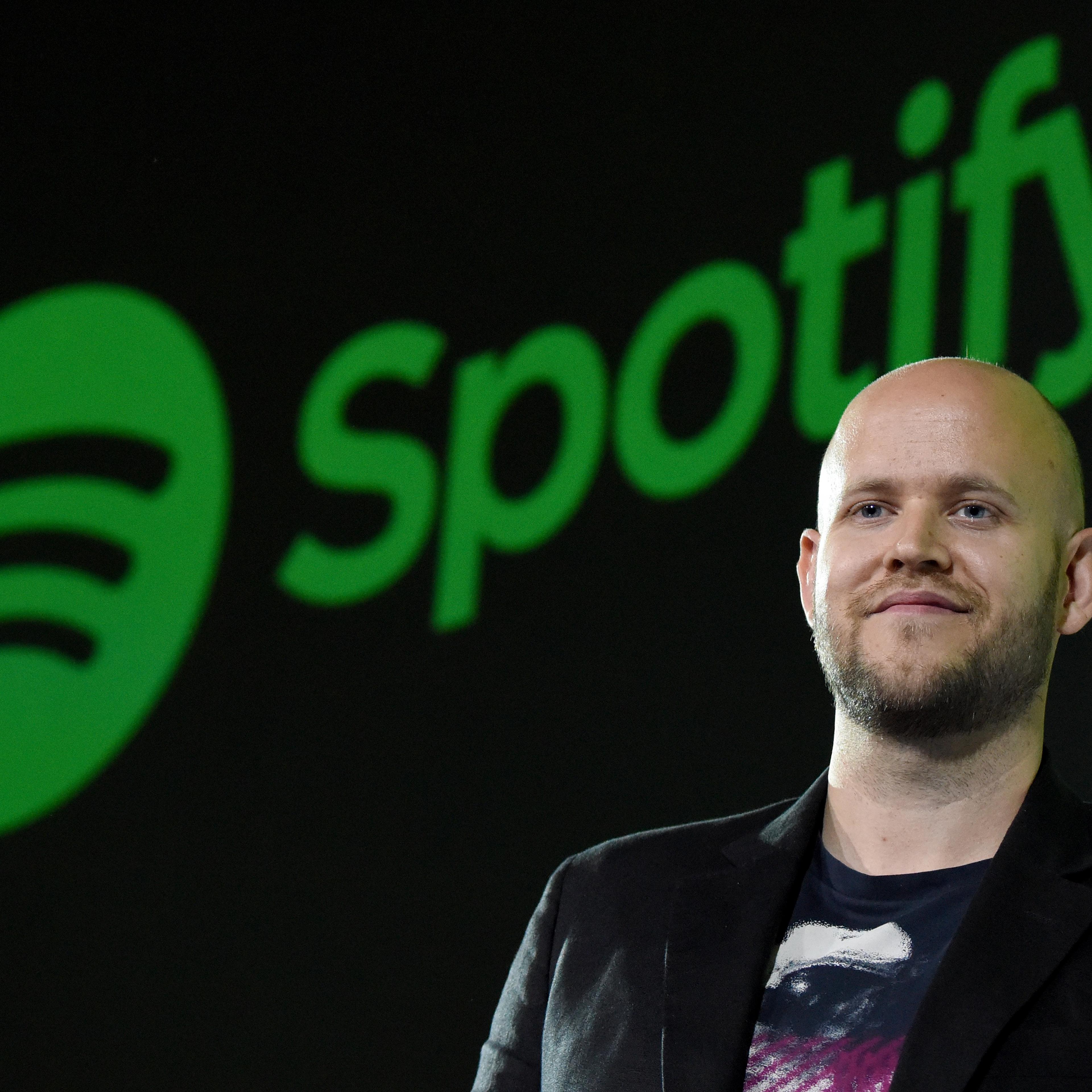 Daniel Ek, CEO of Swedish music streaming service Spotify, poses for photographers at a press conference in Tokyo on September 29, 2016.
