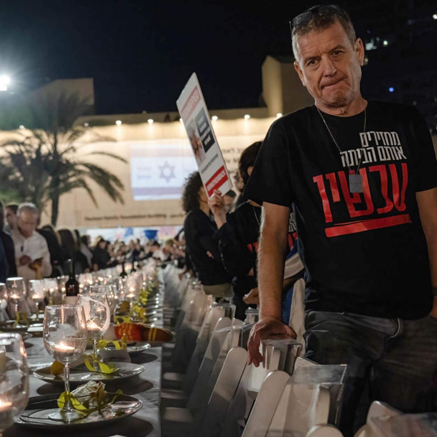 A protester seen wearing a T-shirt with a slogan supporting