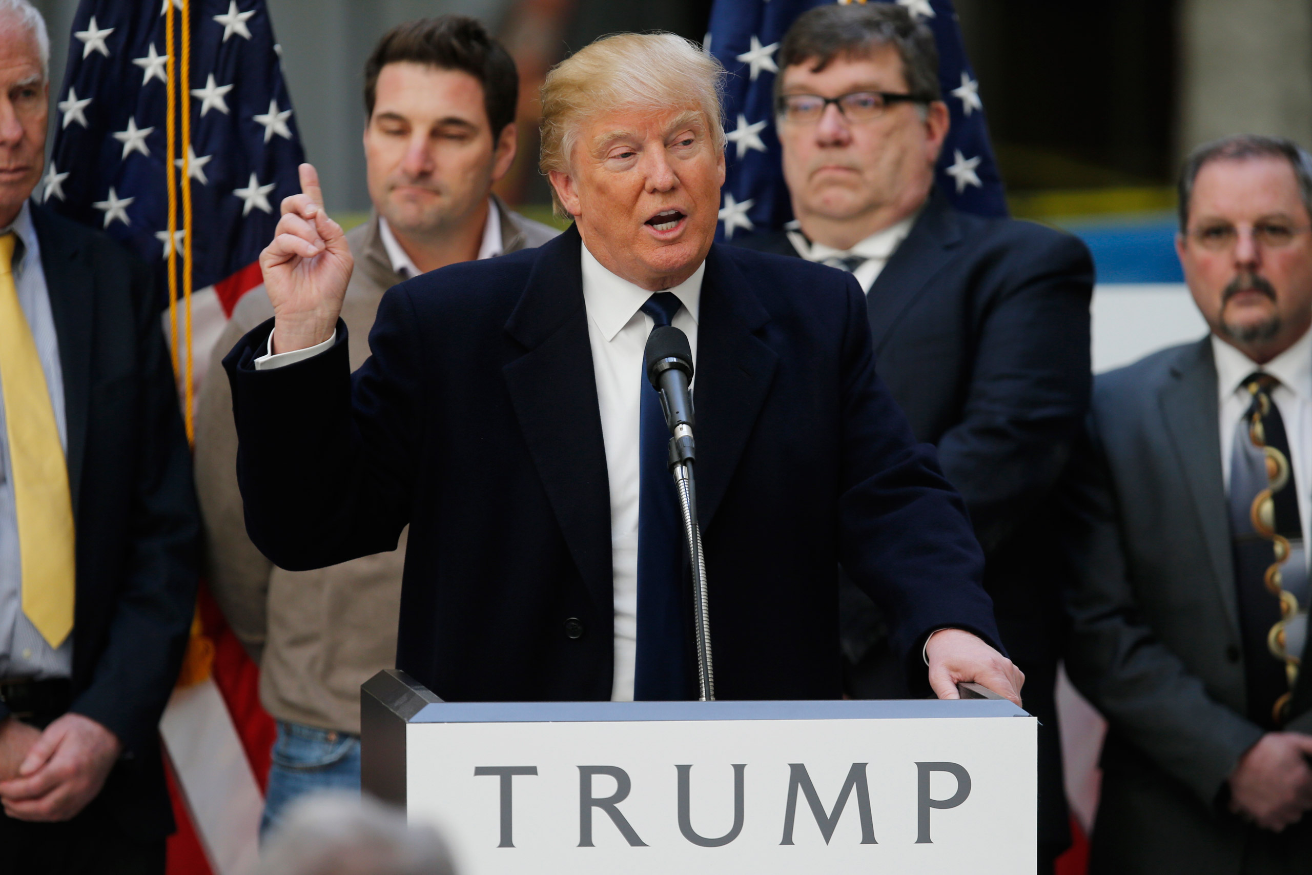 Republican U.S. presidential candidate Donald Trump speaks to the media during a news conference at the construction site of the Trump International Hotel at the Old Post Office Building in Washington, March 21, 2016. REUTERS/Jim Bourg - RTSBIX6