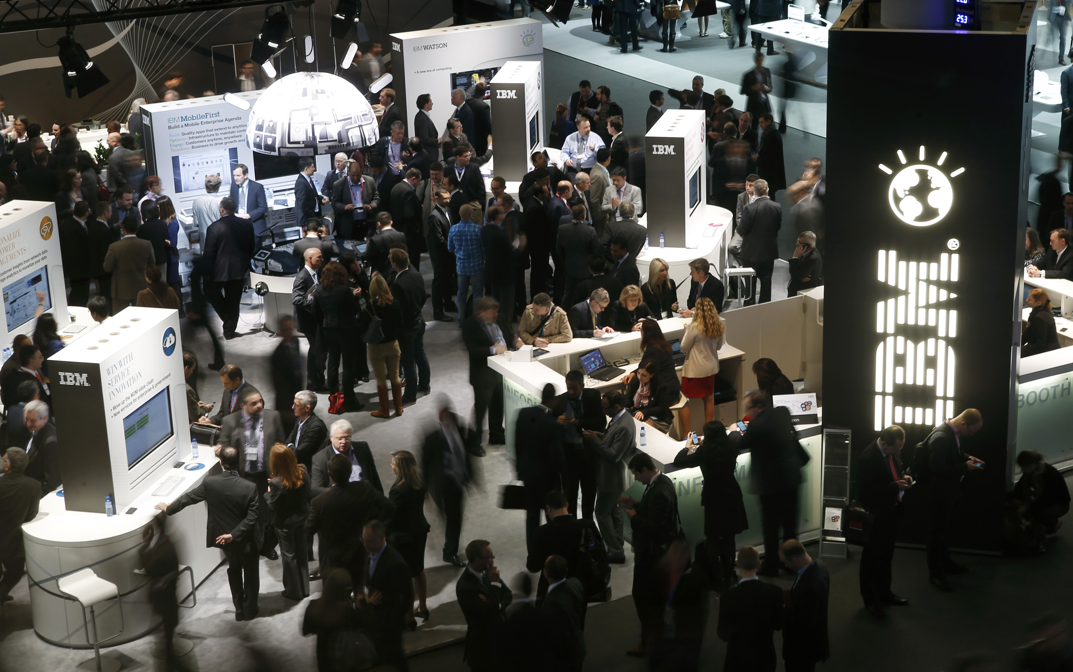 Participants visit the IBM stand at the Mobile World Congress in Barcelona