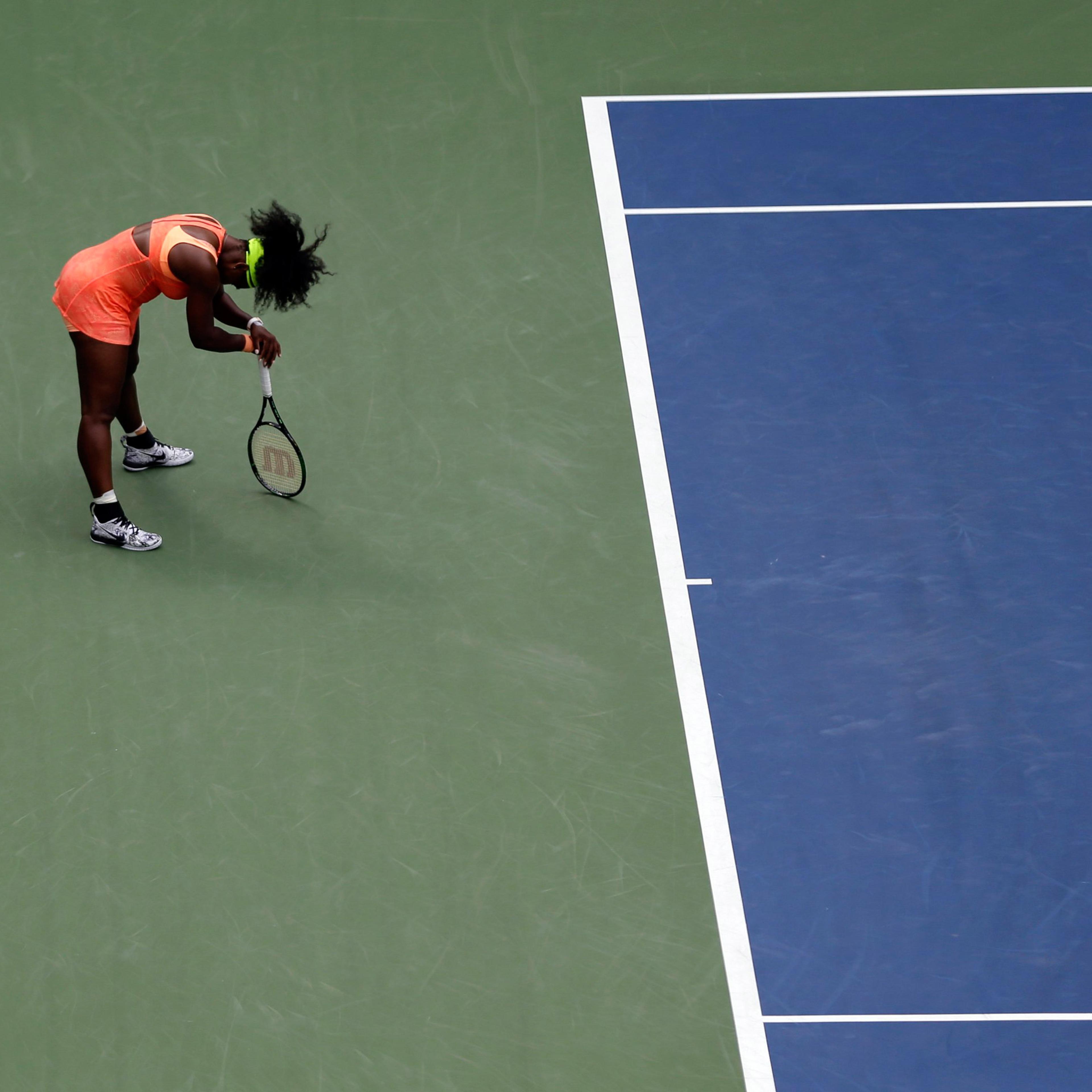 Serena Williams reacts after losing a point to Roberta Vinci, of Italy, during a semifinal match at the U.S. Open tennis tournament, Friday, Sept. 11, 2015, in New York. (AP Photo/Seth Wenig)