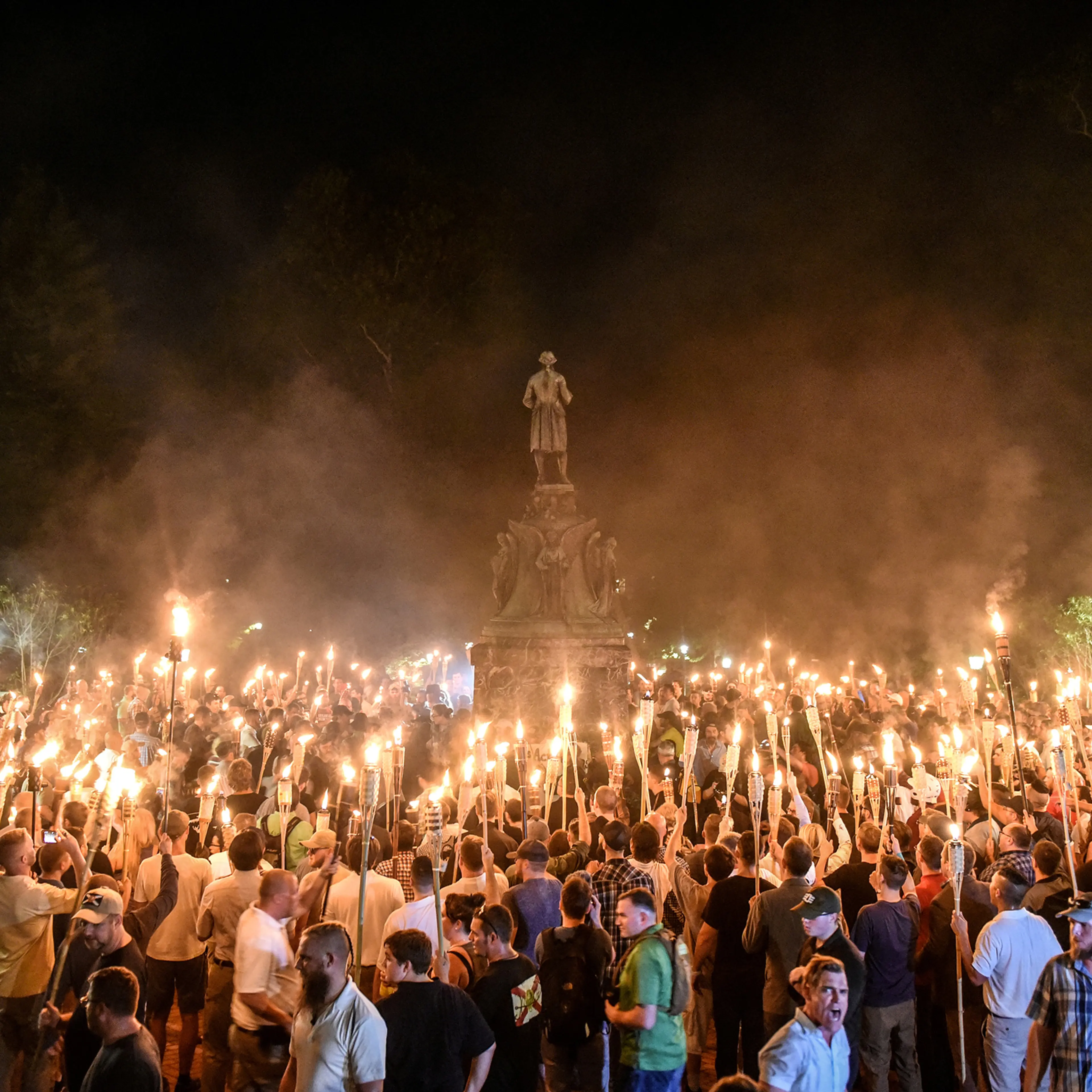White nationalists participate in a torch-lit march on the grounds of the University of Virginia ahead of the Unite the Right Rally in Charlottesville, Virginia on Aug. 11, 2017