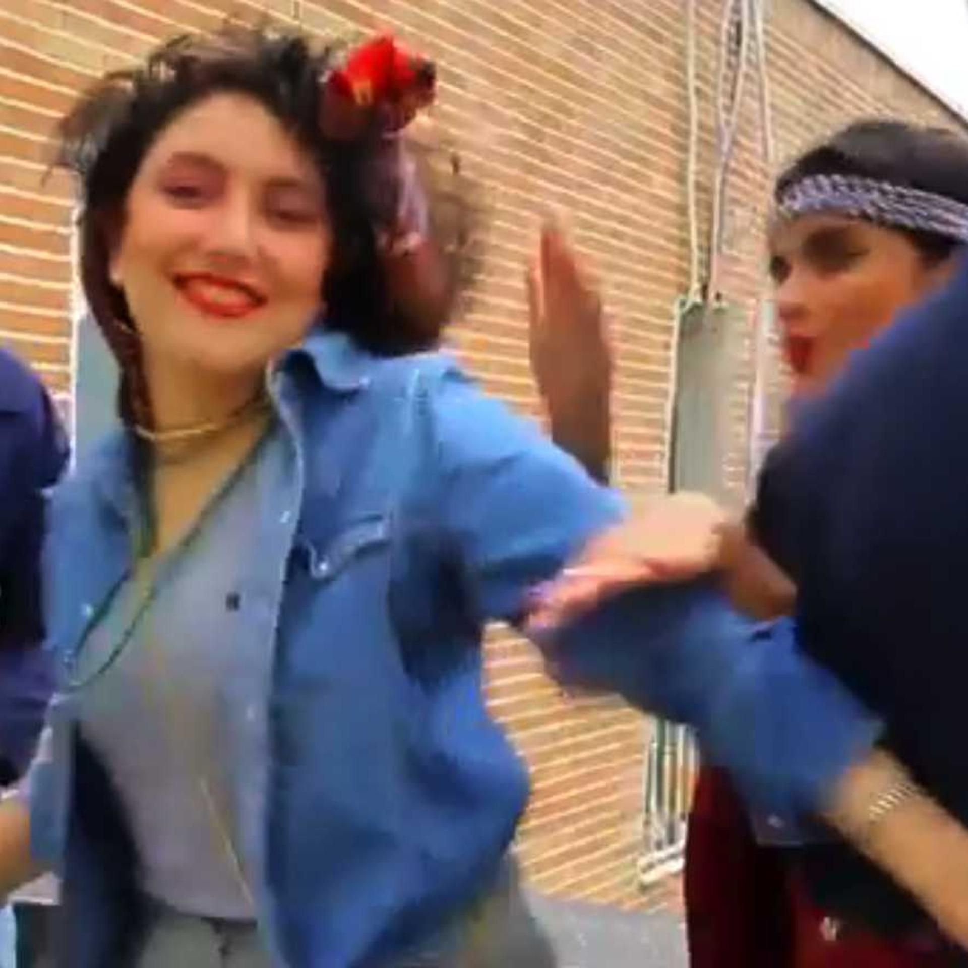 In this frame grab taken from video posted to YouTube, people dance to Pharrell Williams' hit song "Happy" on a rooftop in Tehran