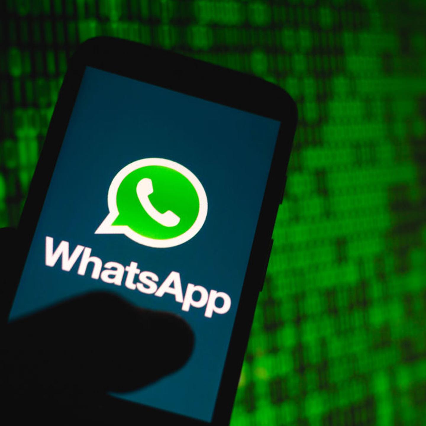 In this photo illustration the WhatsApp logo seen displayed
