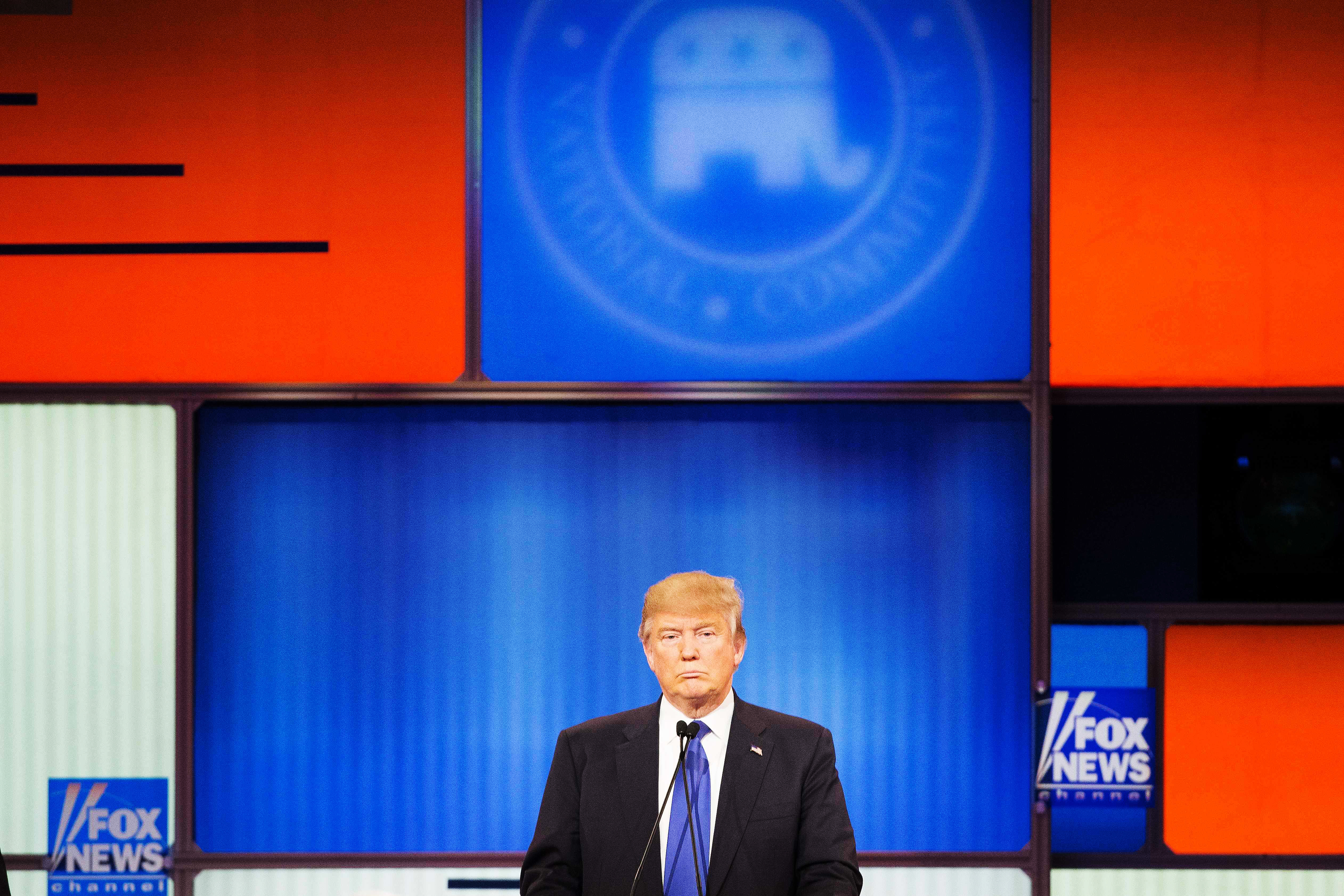 Republican presidential candidate Donald Trump participates in a debate in Detroit on March 3, 2016.