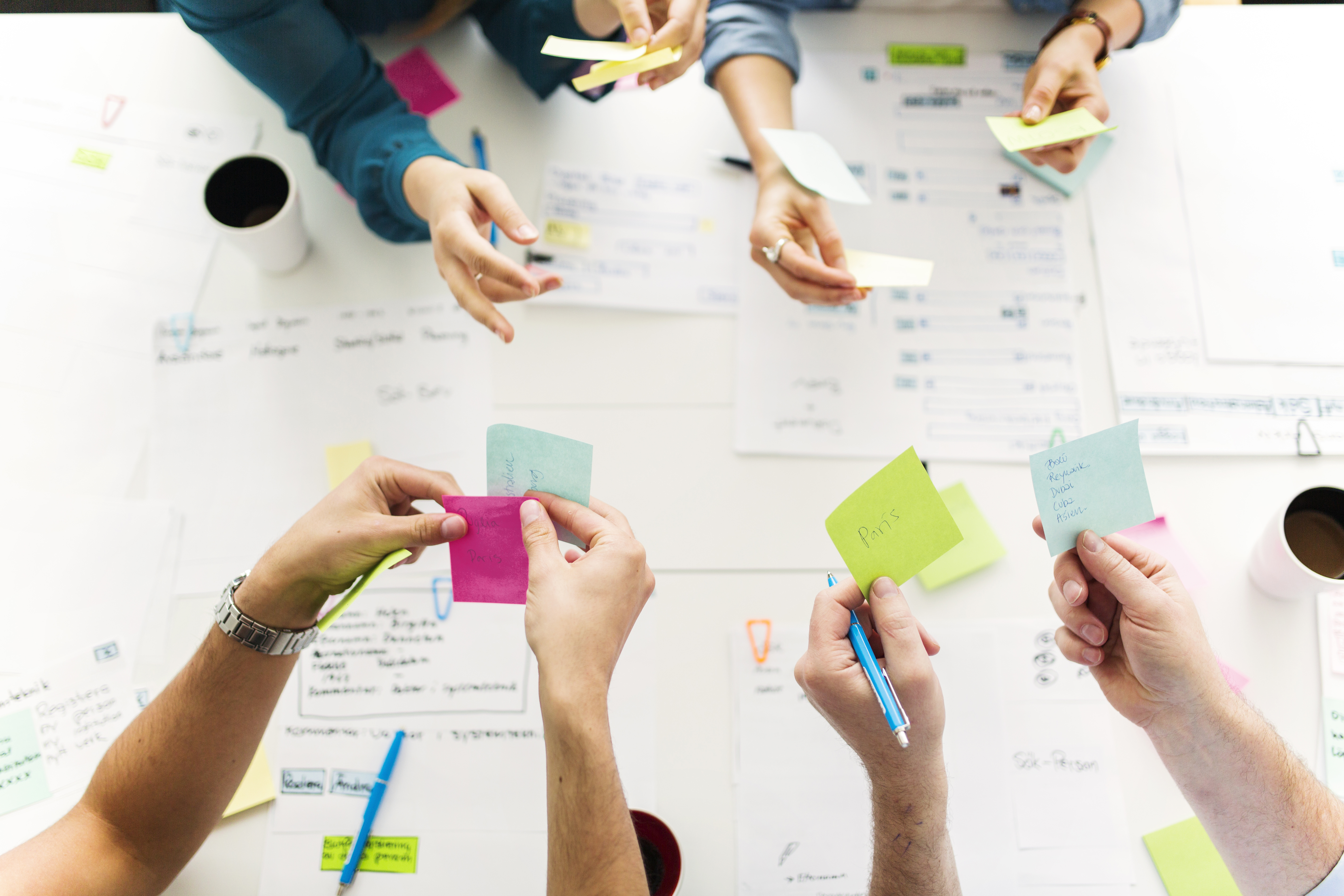 Colleagues with sticky notes