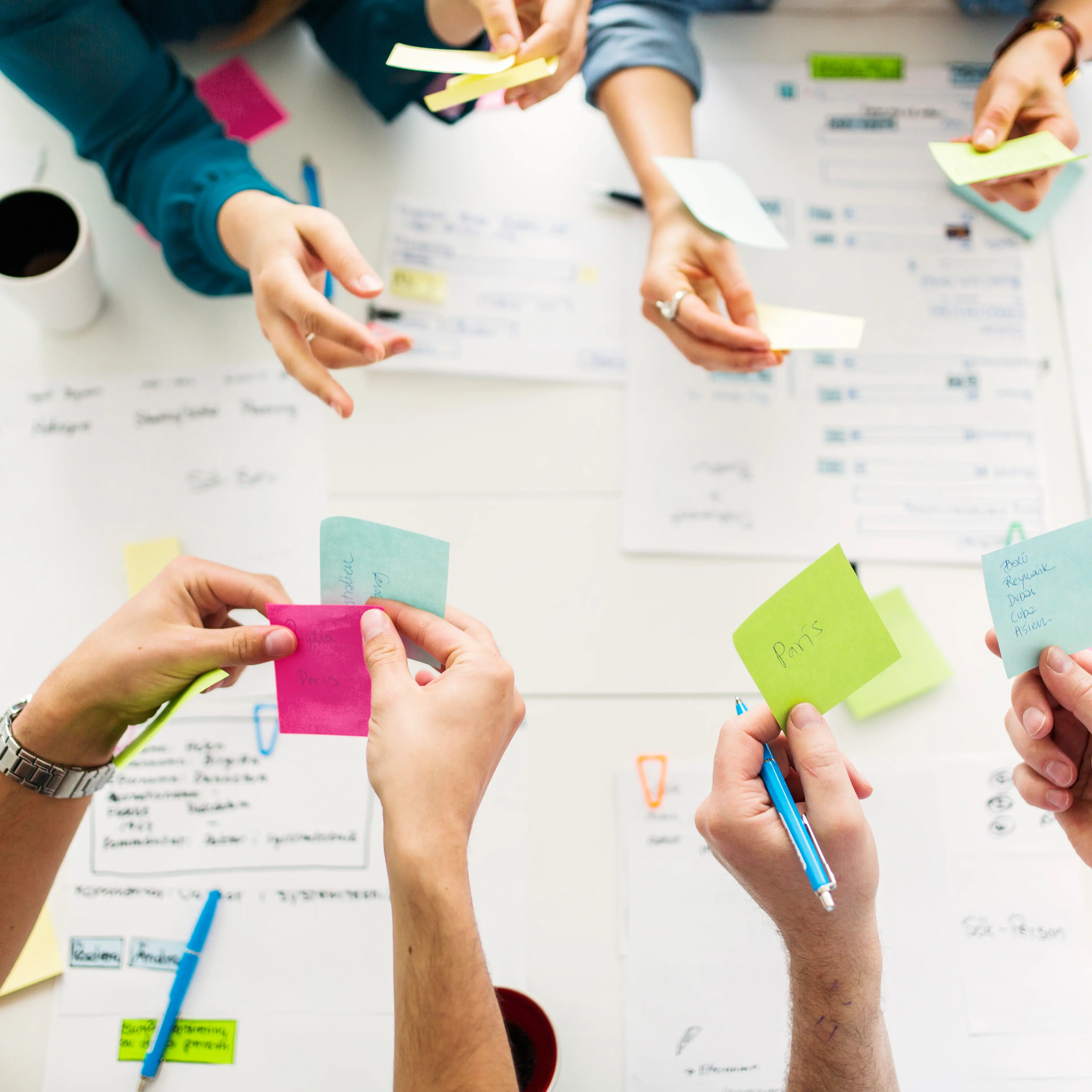 Colleagues with sticky notes