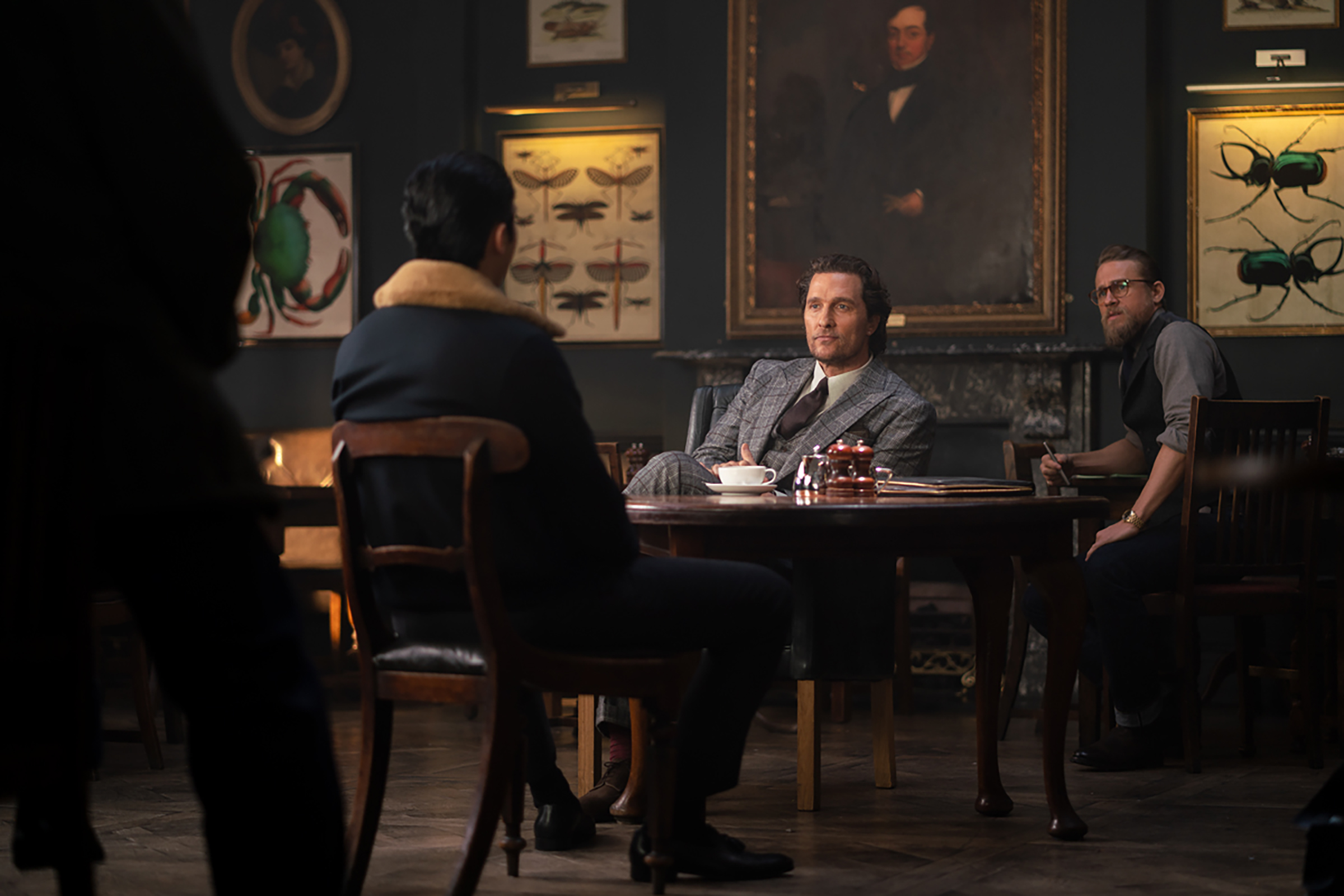 Golding, McConaughey and Hunnam try to make a gentleman’s agreement.