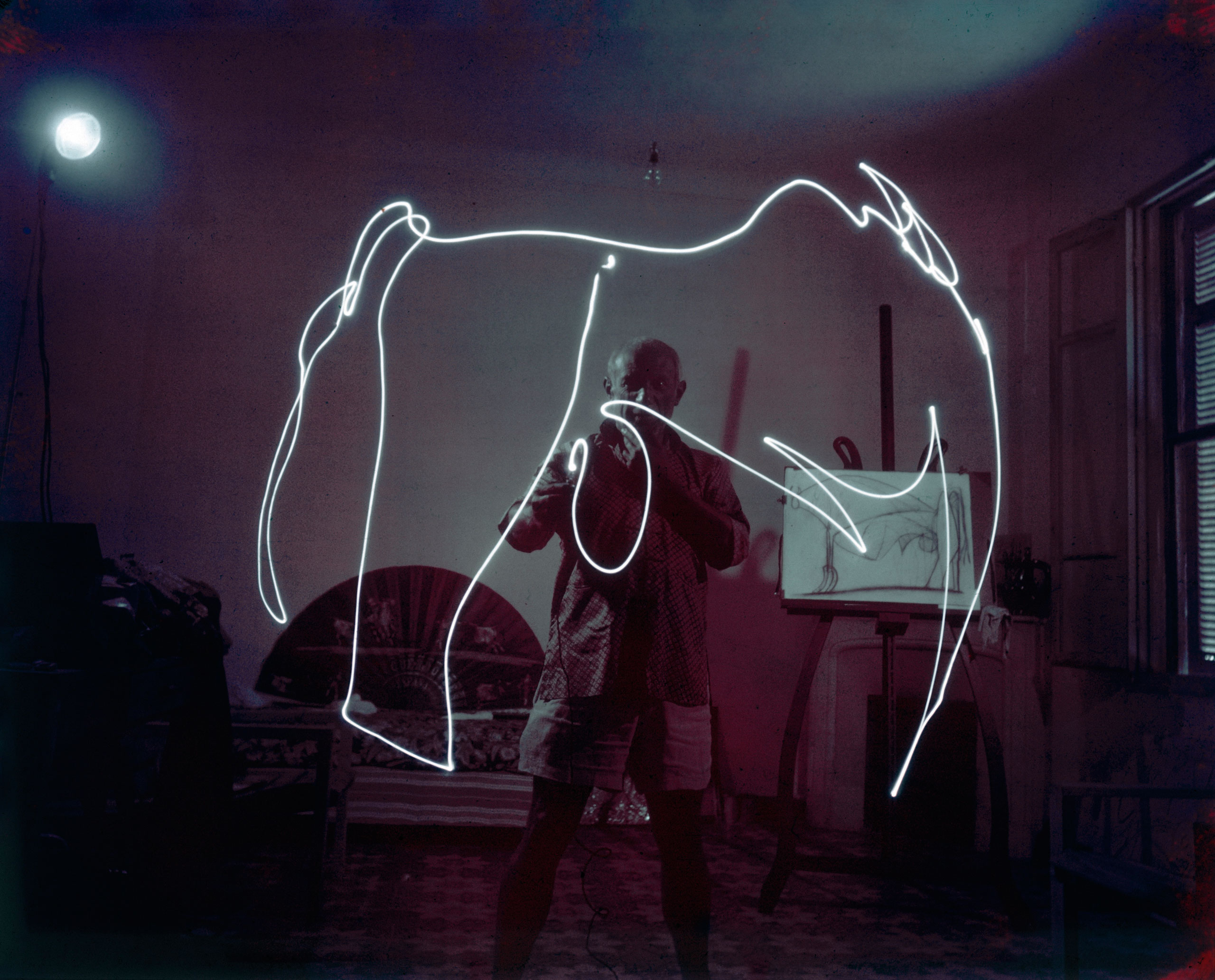 Pablo Picasso creates a light drawing, 1949.