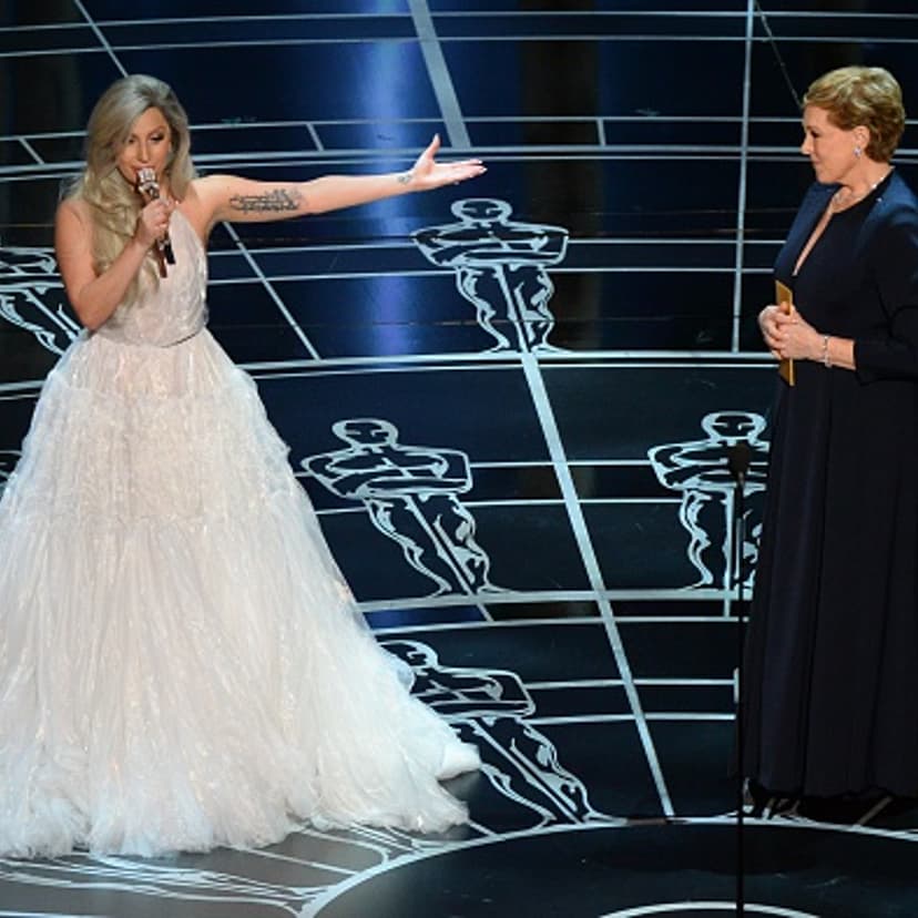 Lady Gaga presents Julie Andrews on stage at the 87th Oscars in Hollywood, Calif. on Feb. 22, 2015.