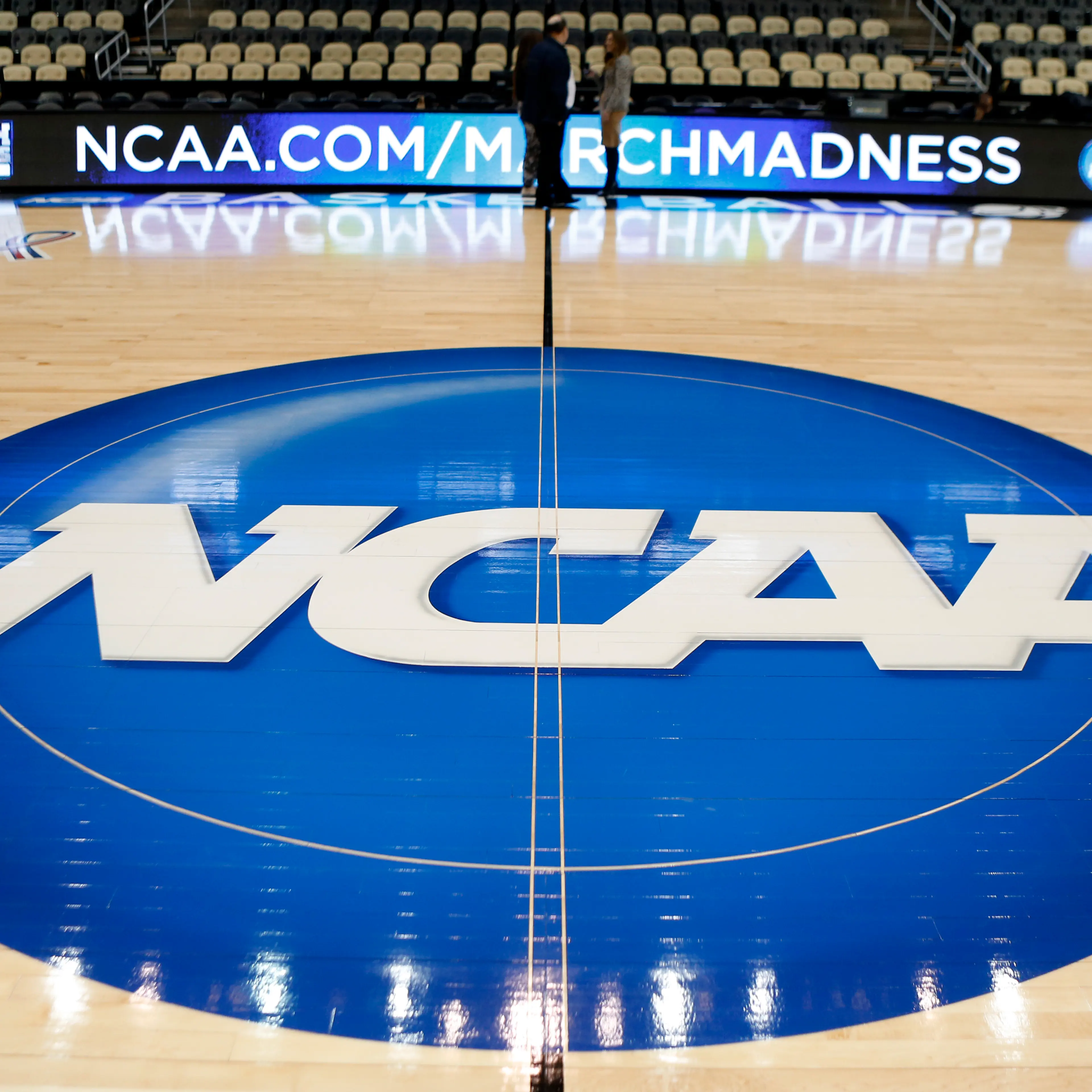 The NCAA logo at center court at The Consol Energy Center in Pittsburgh, March 18, 2015.