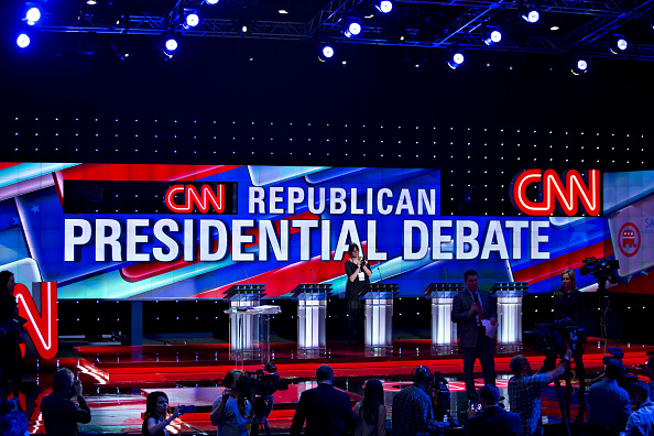 Members of the media tour the debate hall ahead of the Republican presidential primary candidate debate sponsored by CNN and Telemundo at the University of Houston in Houston, Texas, U.S., on Thursday, Feb. 25, 2016.