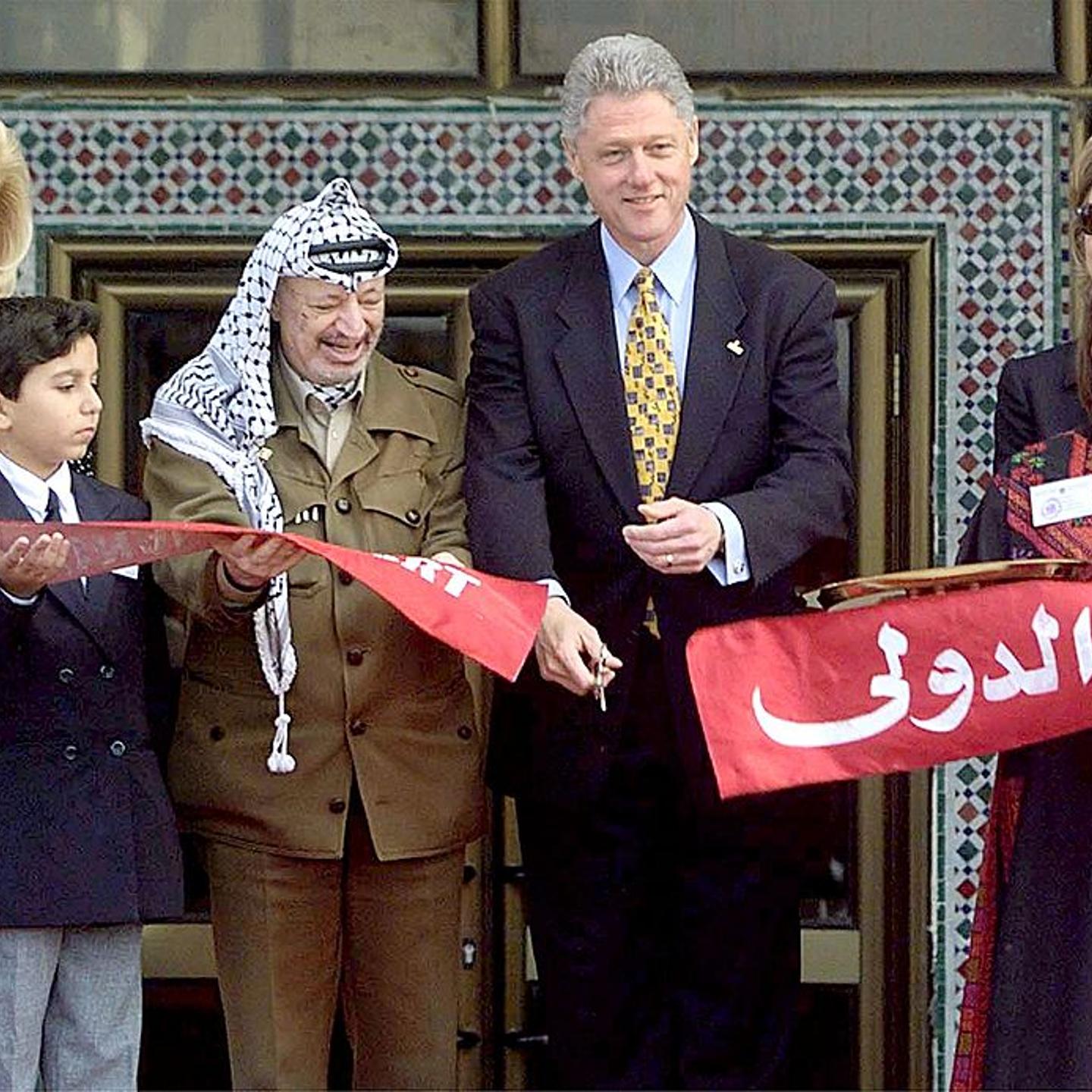 US President Bill Clinton cuts the ribbon at Gaza International Airport