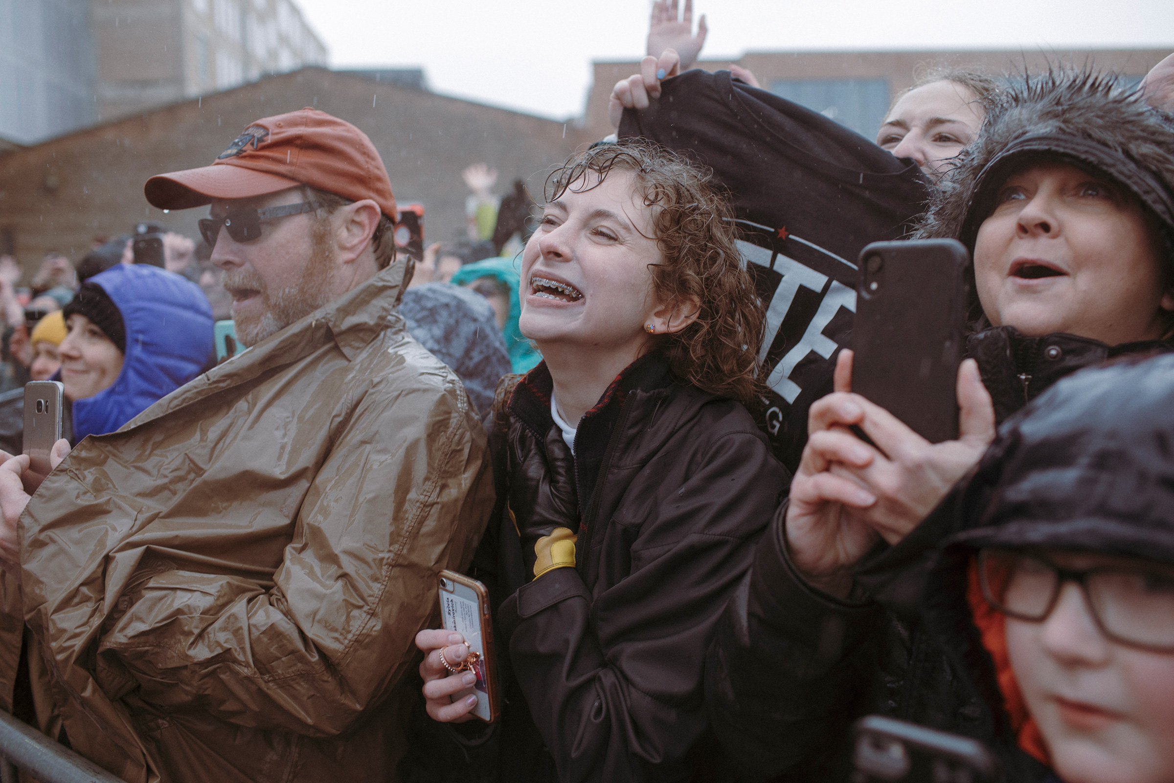 Supporters wait in the rain April 14 for Buttigieg’s presidential campaign announcement in South Bend.