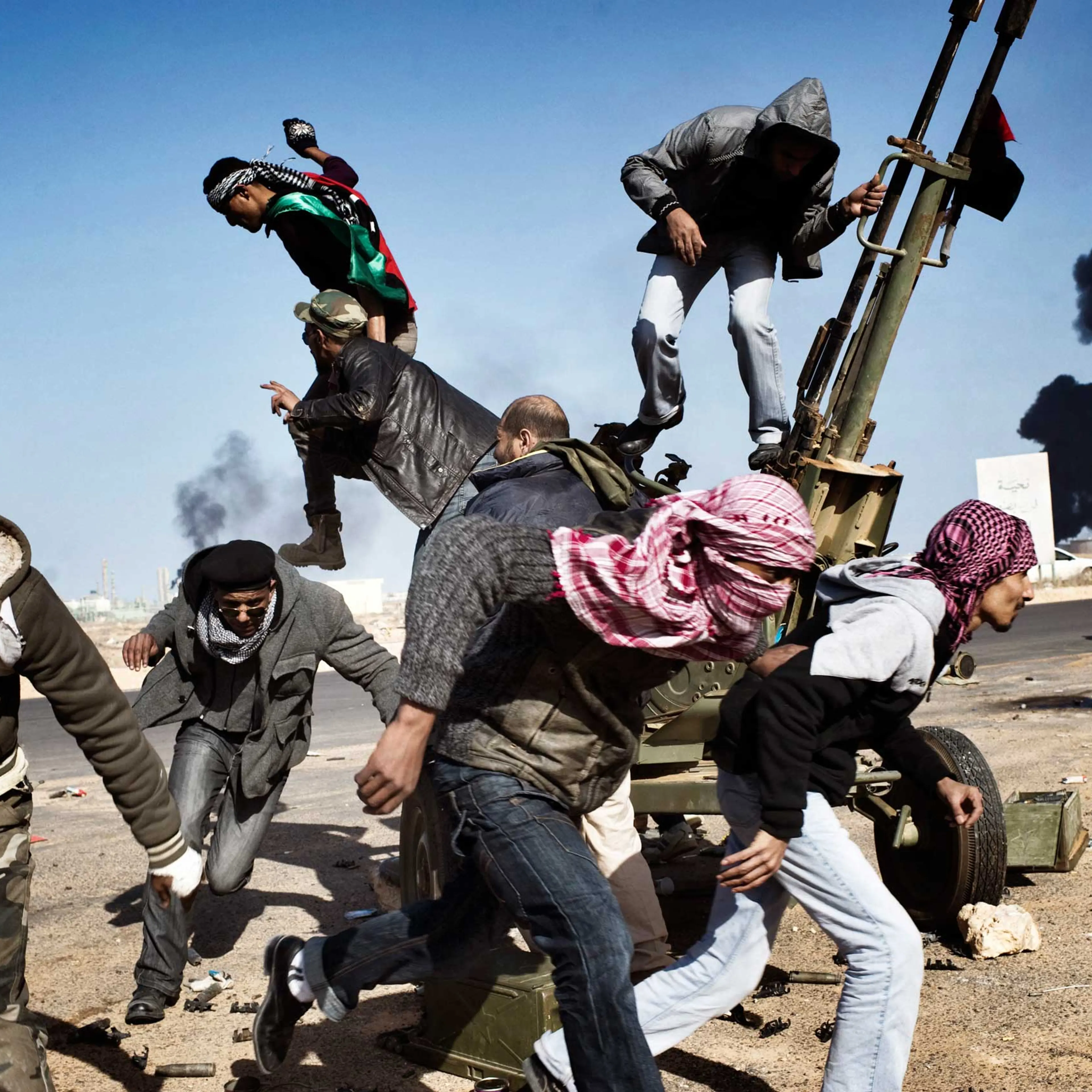 Yuri Kozyrev. Ras Lanuf, Libya. March 11, 2011With photography, it's always a moment. You get it, or you miss it. This was on the front lines near Ras Lanuf, Libya. It was near an oil refinery factory that was important for both sidesÑboth the rebels and