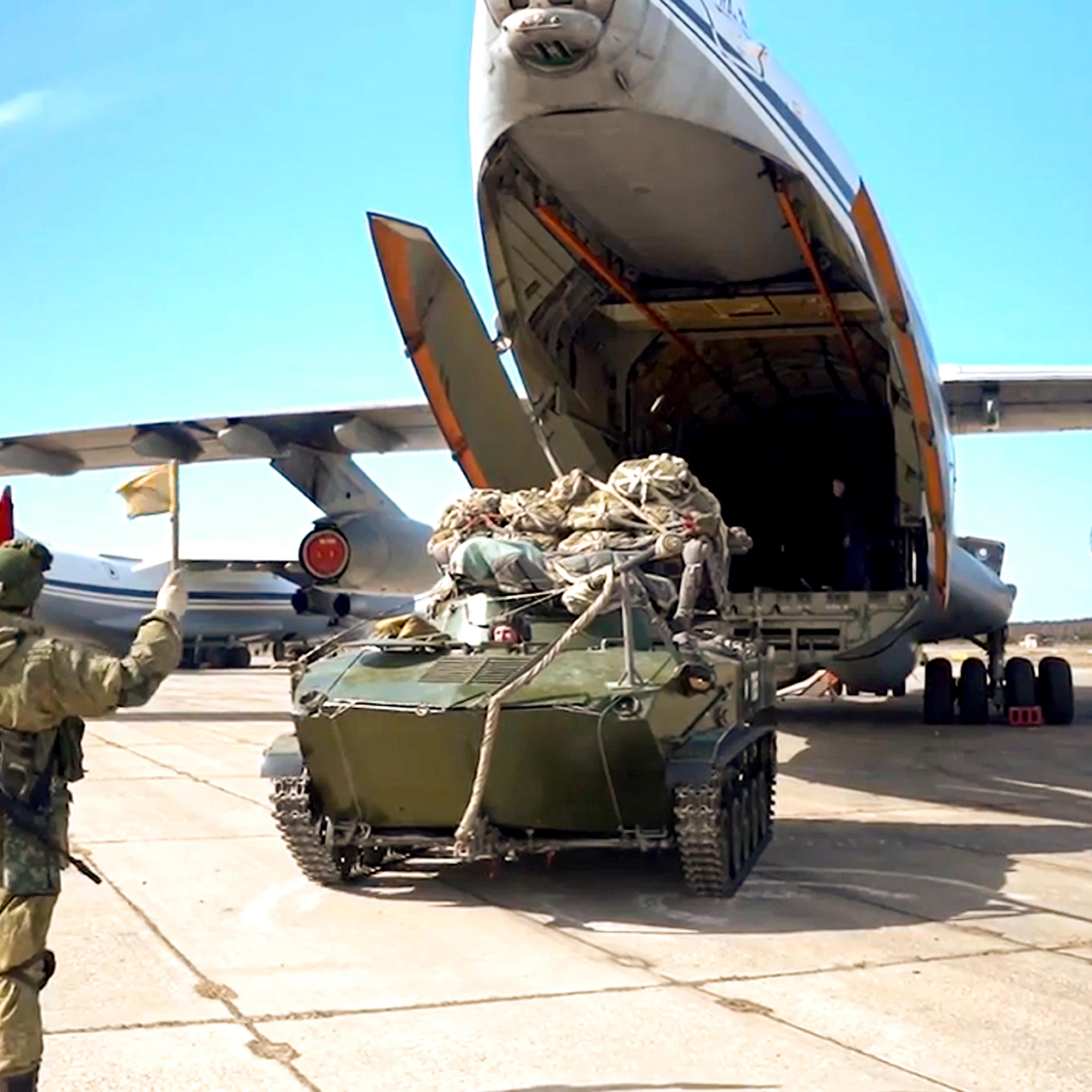 A Russian military vehicle prepares to be loaded into a plane during maneuvers in Crimea, in this image released on April 22