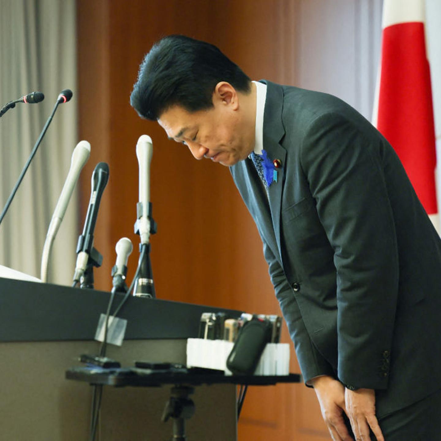 Japan's Defence Minister Minoru Kihara bows during a press conference at the Defence Ministry in Tokyo on July 12, 2024.