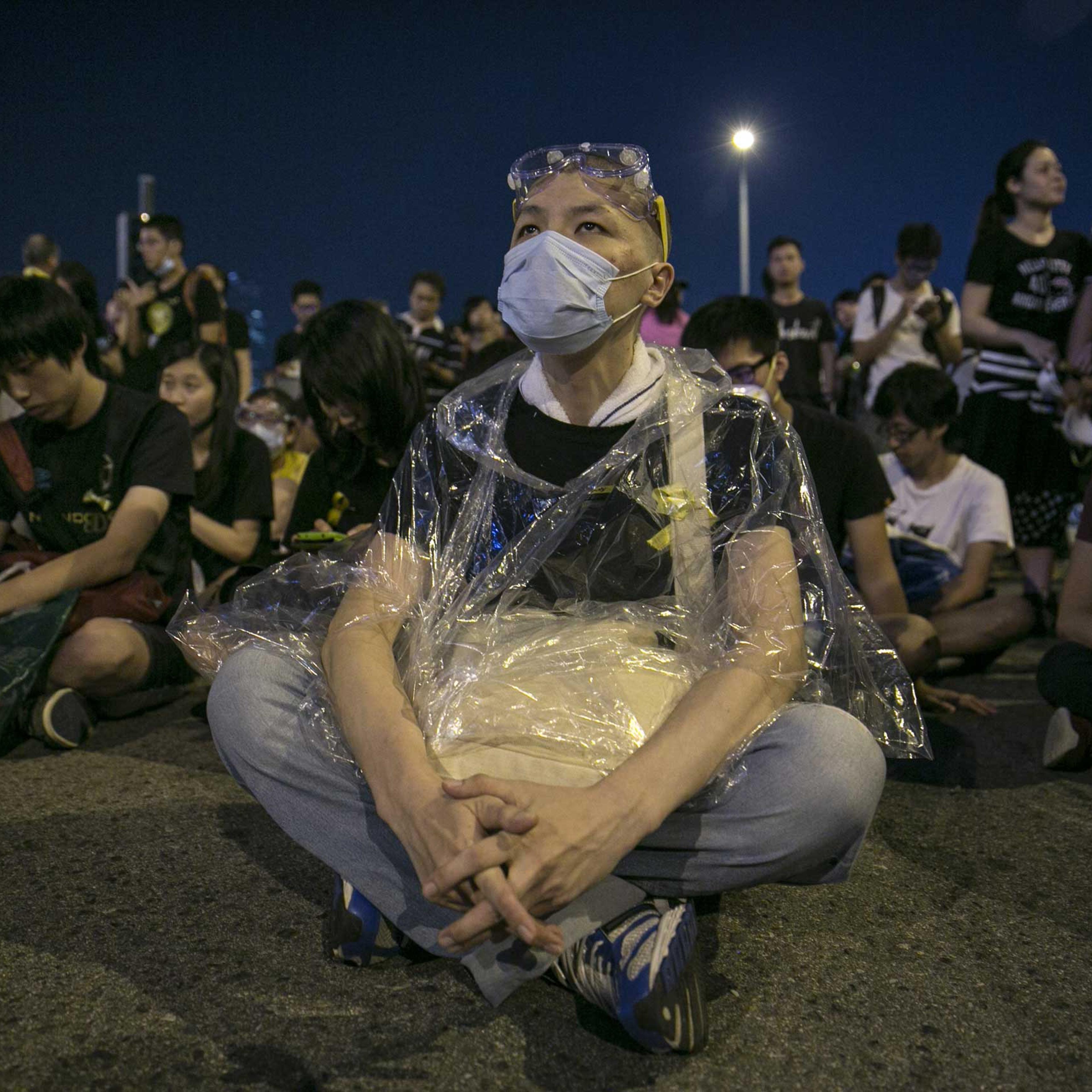 Protesters sit behind a government building as the standoff continues Oct. 5, 2014 in Hong Kong.