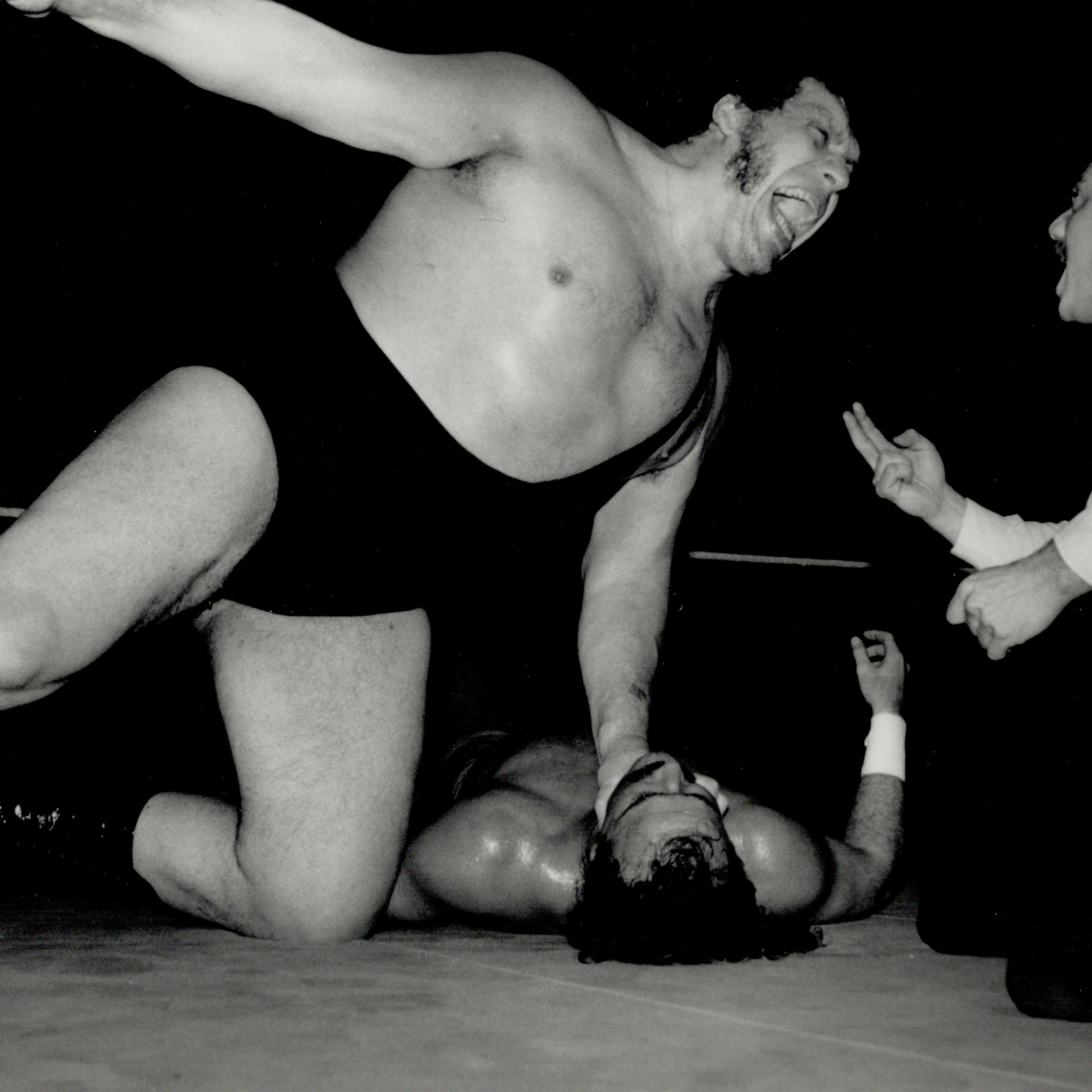 Hot hype: Andre The Giant spews vitriol at the referee as fans put in their two cents' worth.