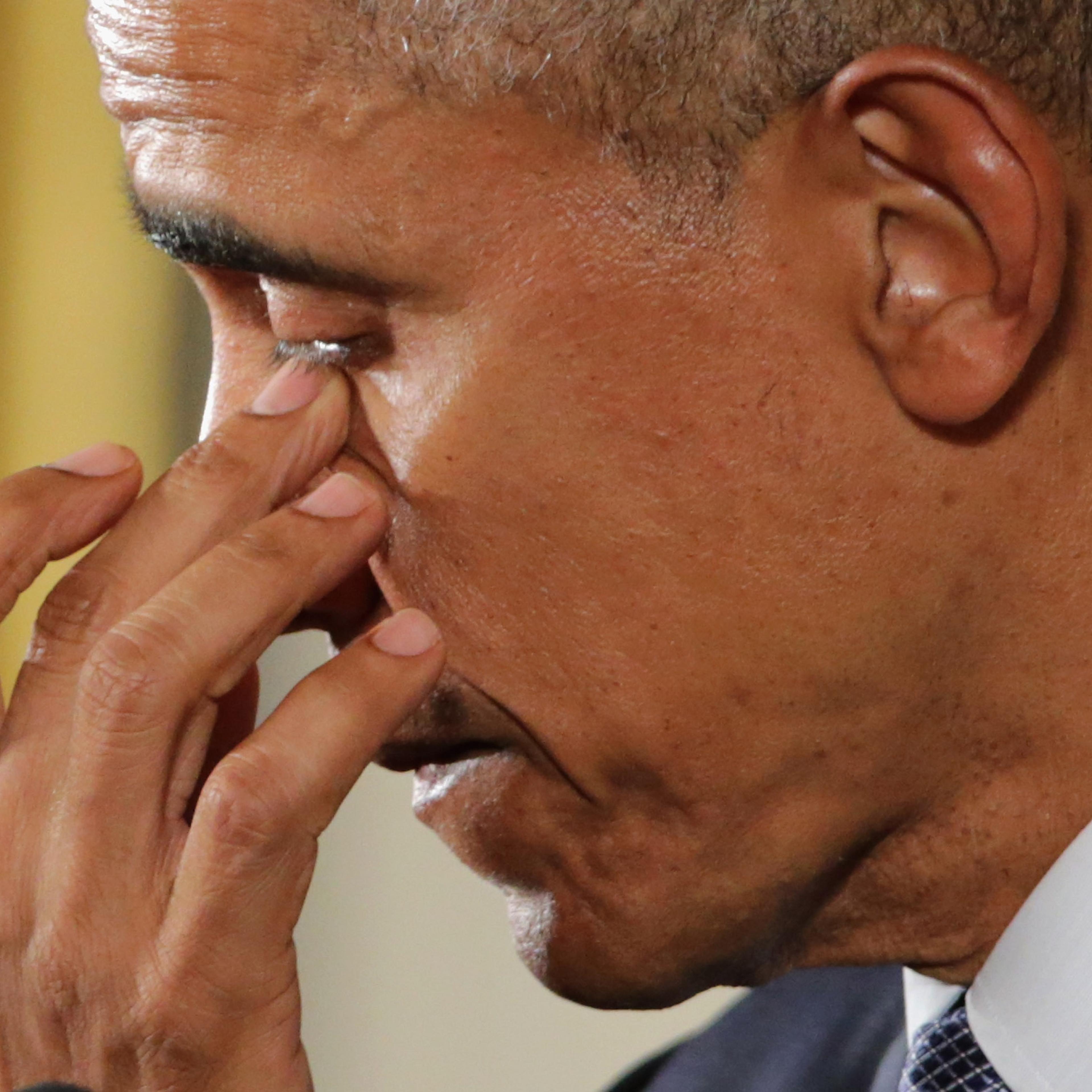 U.S. President Barack Obama wipes away tears as talks about the victims of the 2012 Sandy Hook Elementary School shooting and about his efforts to increase federal gun control in the East Room of the White House in Washington, D.C., on Jan. 5, 2016