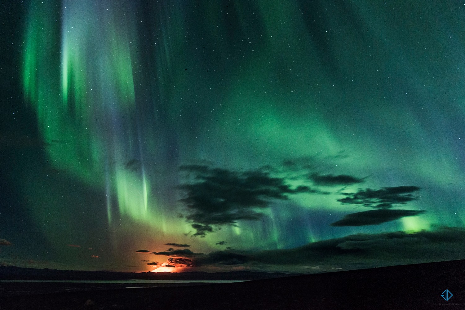 The Bardarbunga volcano erupts under the aurora borealis in the Holuhraun lava field in the east highlands of Iceland near Snæfell on Sept. 2, 2014.
