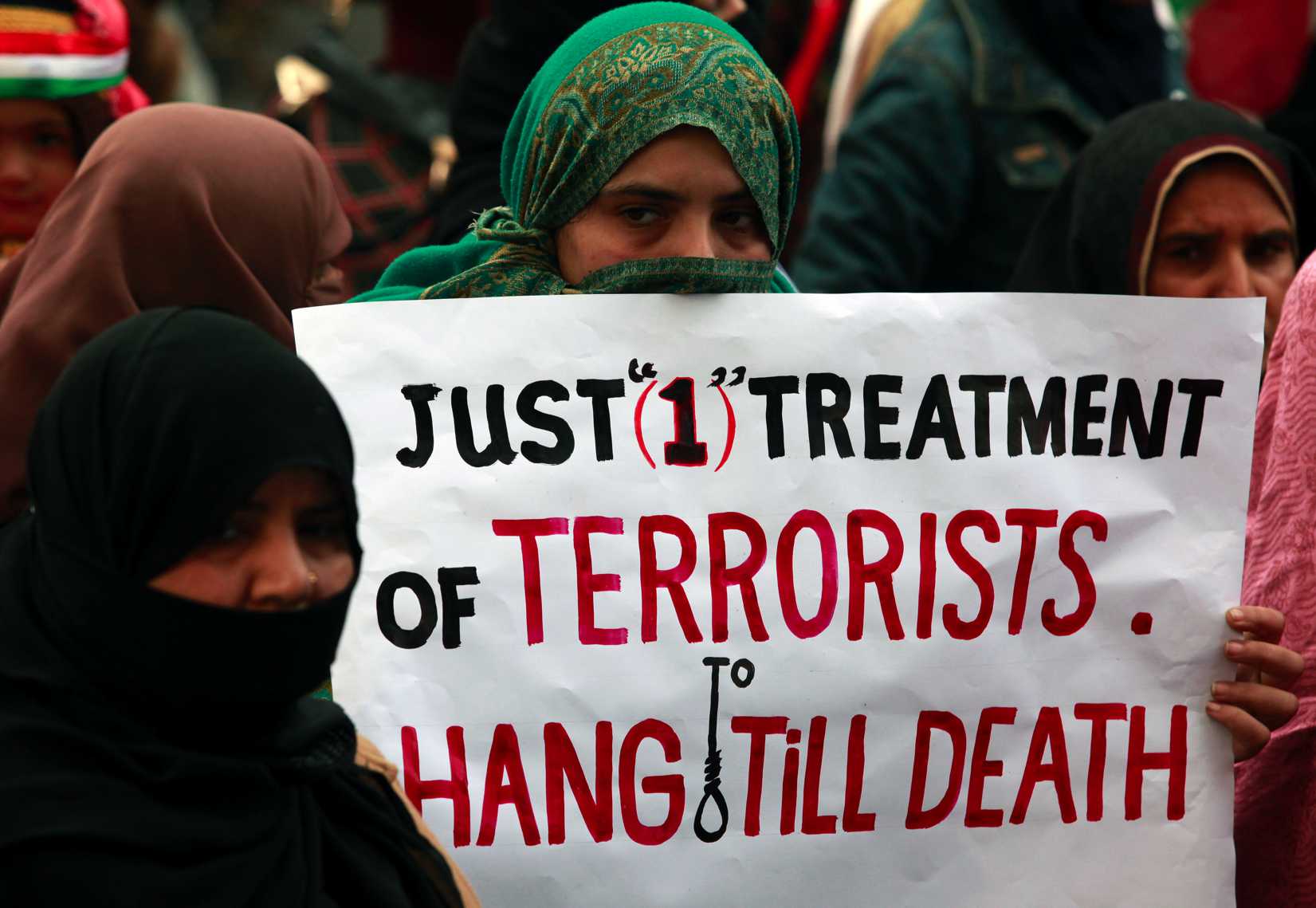 Demonstrators in the Pakistani city of Lahore on Dec. 21, 2014, condemn the attack by Taliban gunmen on the Army Public School in Peshawar 