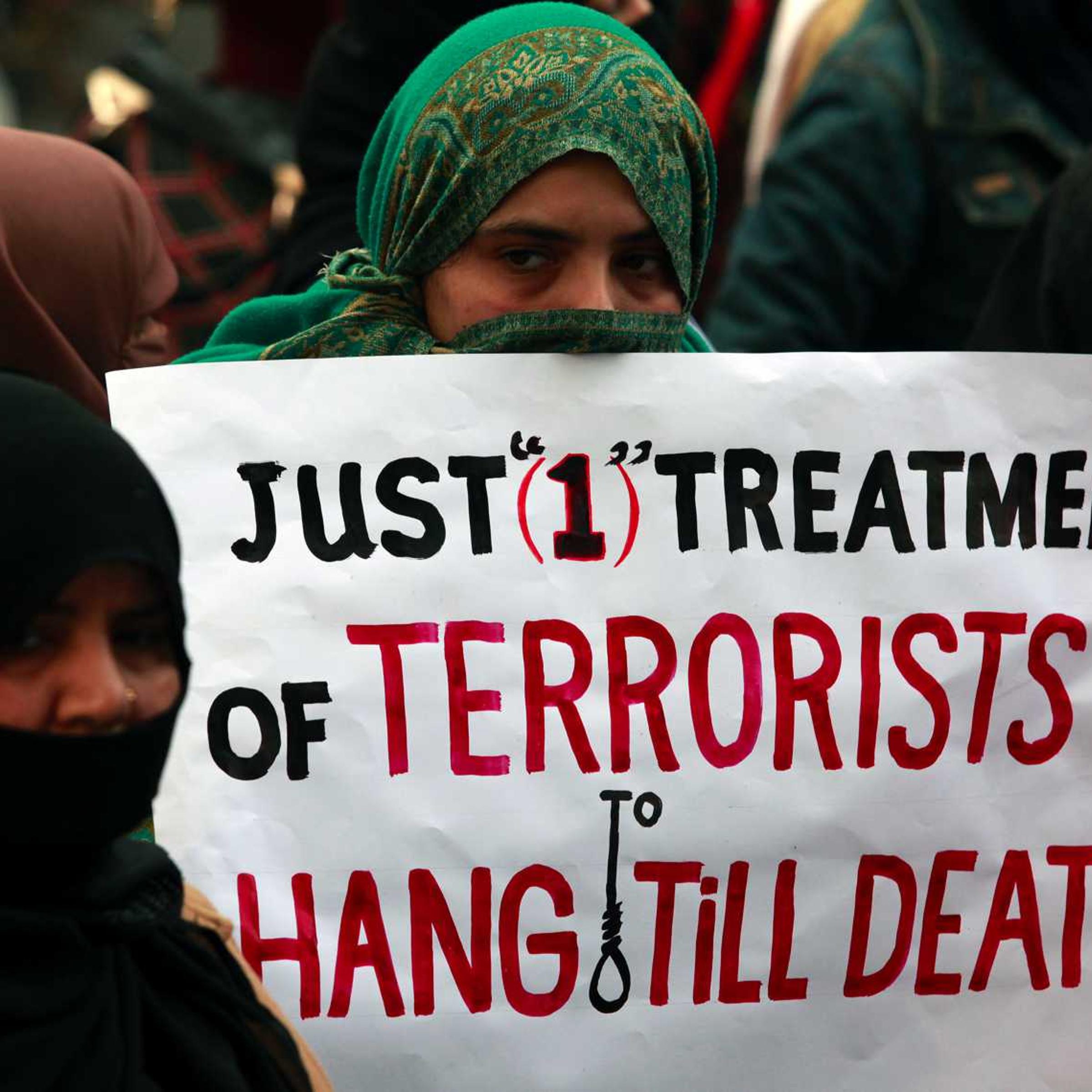 Demonstrators in the Pakistani city of Lahore on Dec. 21, 2014, condemn the attack by Taliban gunmen on the Army Public School in Peshawar