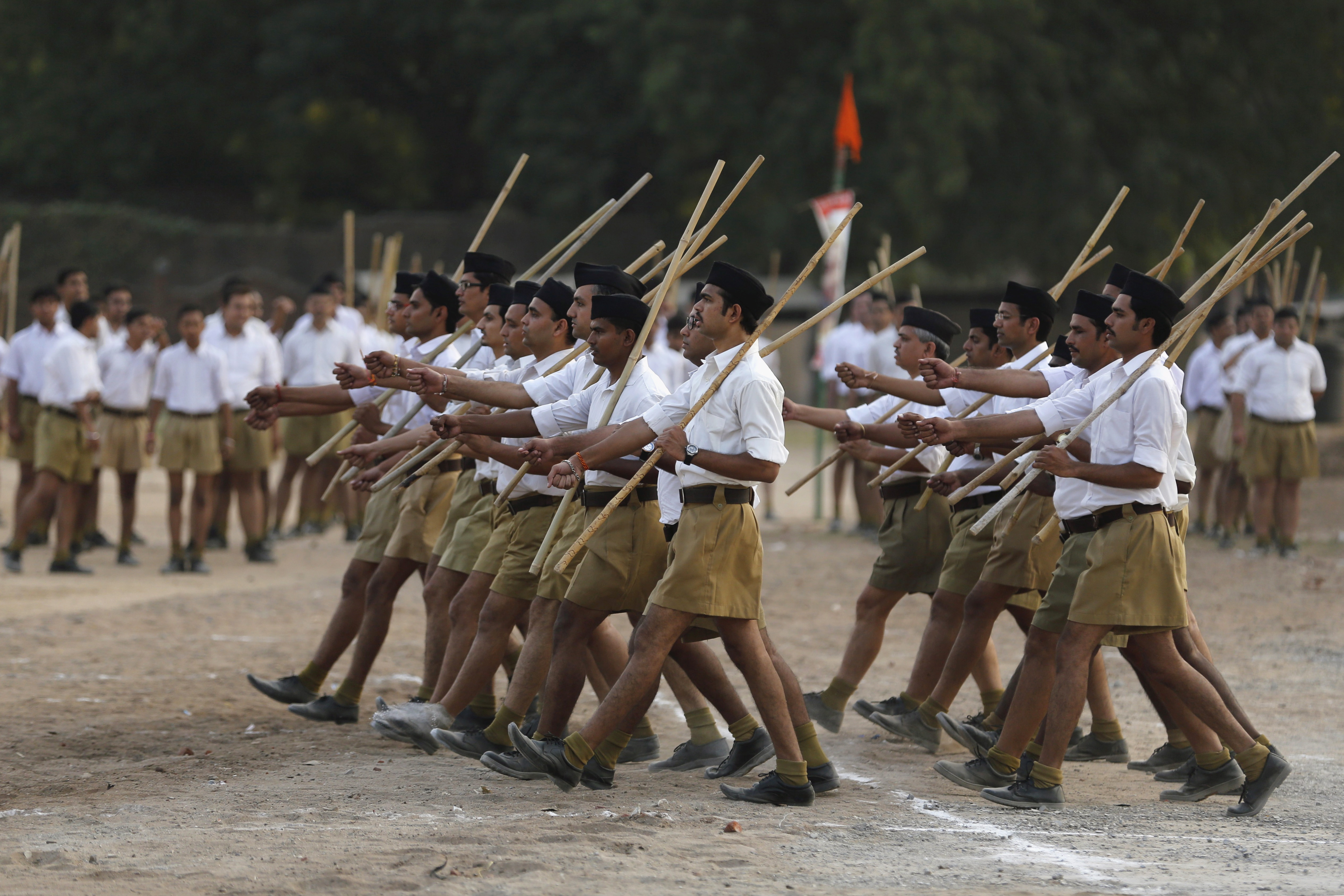 RSS volunteers take part in the "Path-Sanchalan" during celebrations to mark Vijaya Dashmi or Dussehra in Ahmedabad