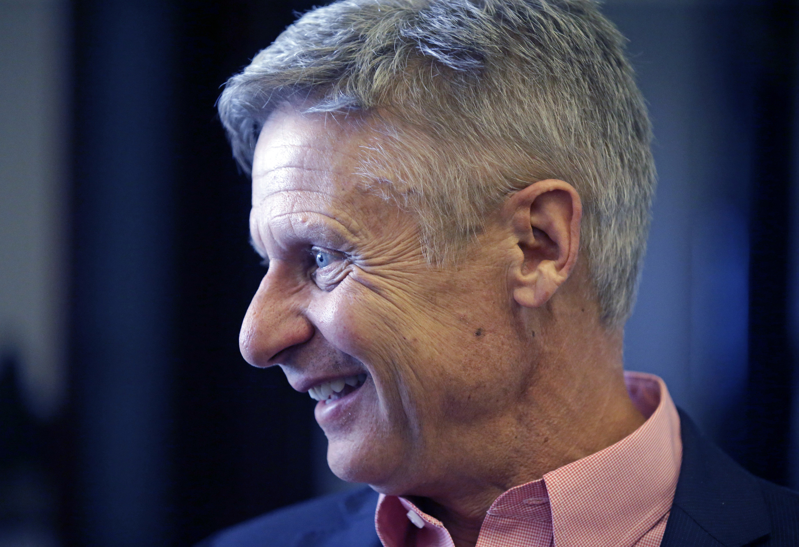 FILE - In this May 18, 2016 file photo, Libertarian presidential candidate, former New Mexico Gov. Gary Johnson speak with legislators at the Utah State Capitol in Salt Lake City. He has virtually no money, no strategy to compete in battleground states a
