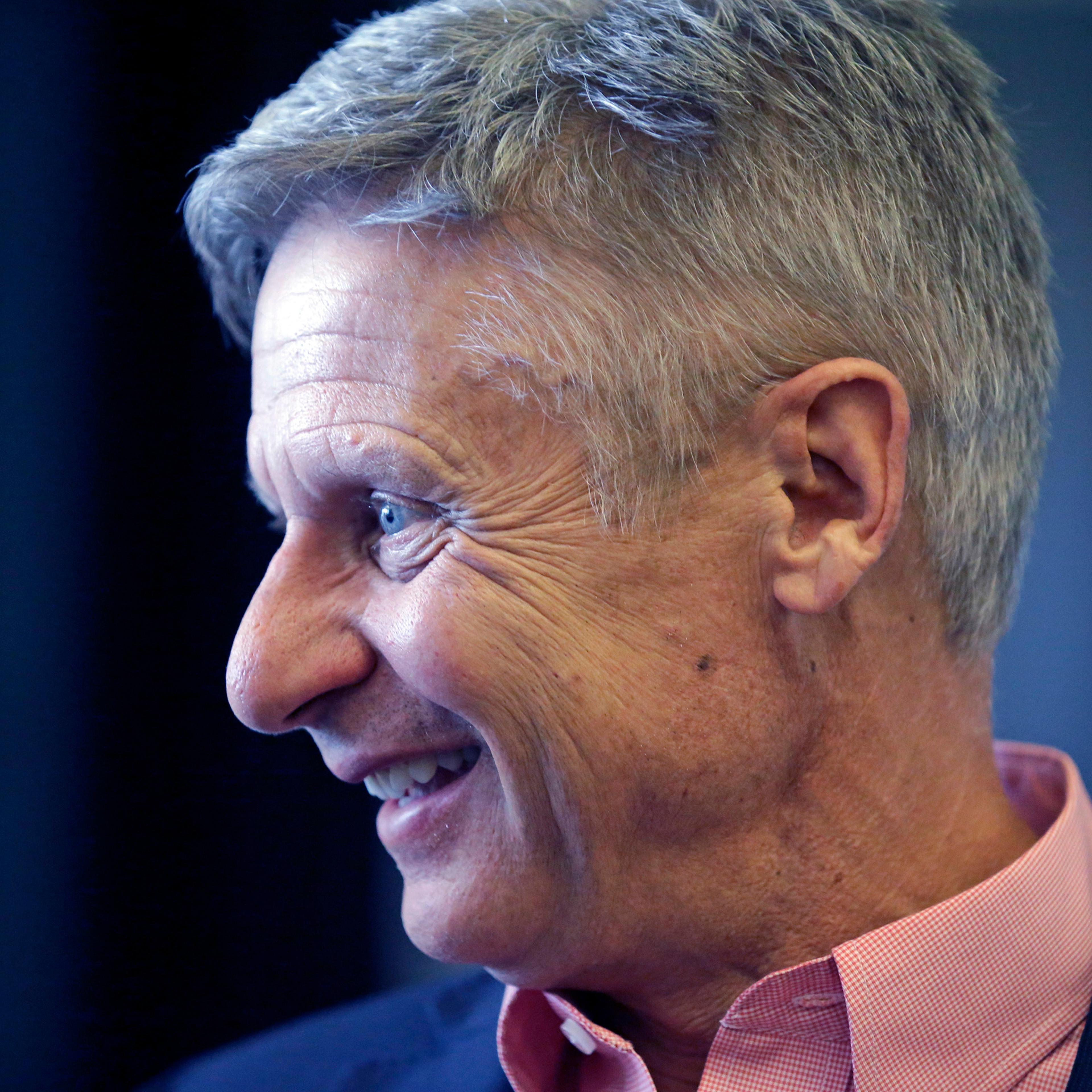 FILE - In this May 18, 2016 file photo, Libertarian presidential candidate, former New Mexico Gov. Gary Johnson speak with legislators at the Utah State Capitol in Salt Lake City. He has virtually no money, no strategy to compete in battleground states a