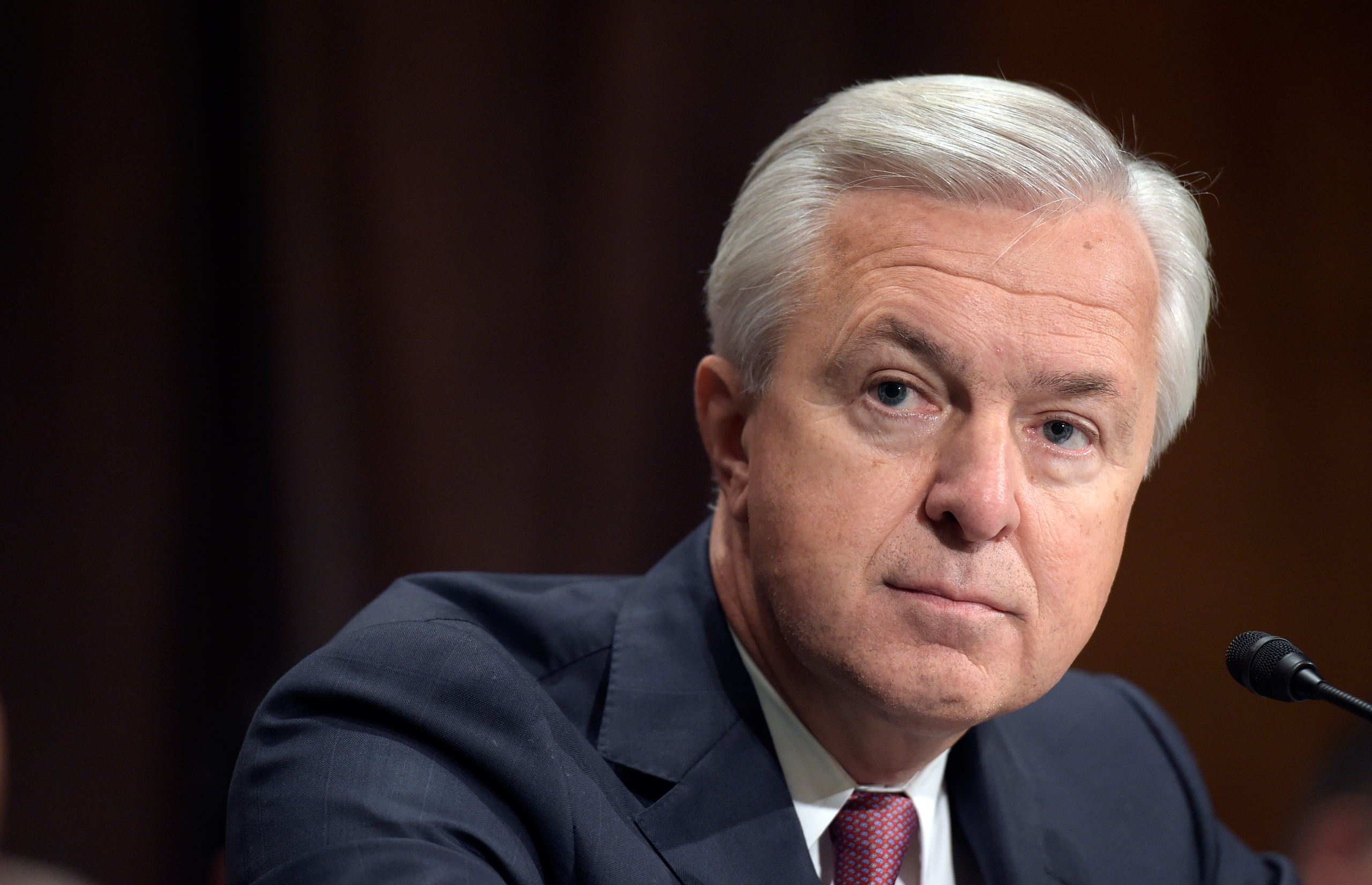 In this Tuesday, Sept. 20, 2016, photo, Wells Fargo CEO John Stumpf testifies on Capitol Hill in Washington, before the Senate Banking Committee. The San Francisco Fed said Thursday, Sept. 22, 2016, that Stumpf is resigning his position on the Federal Re