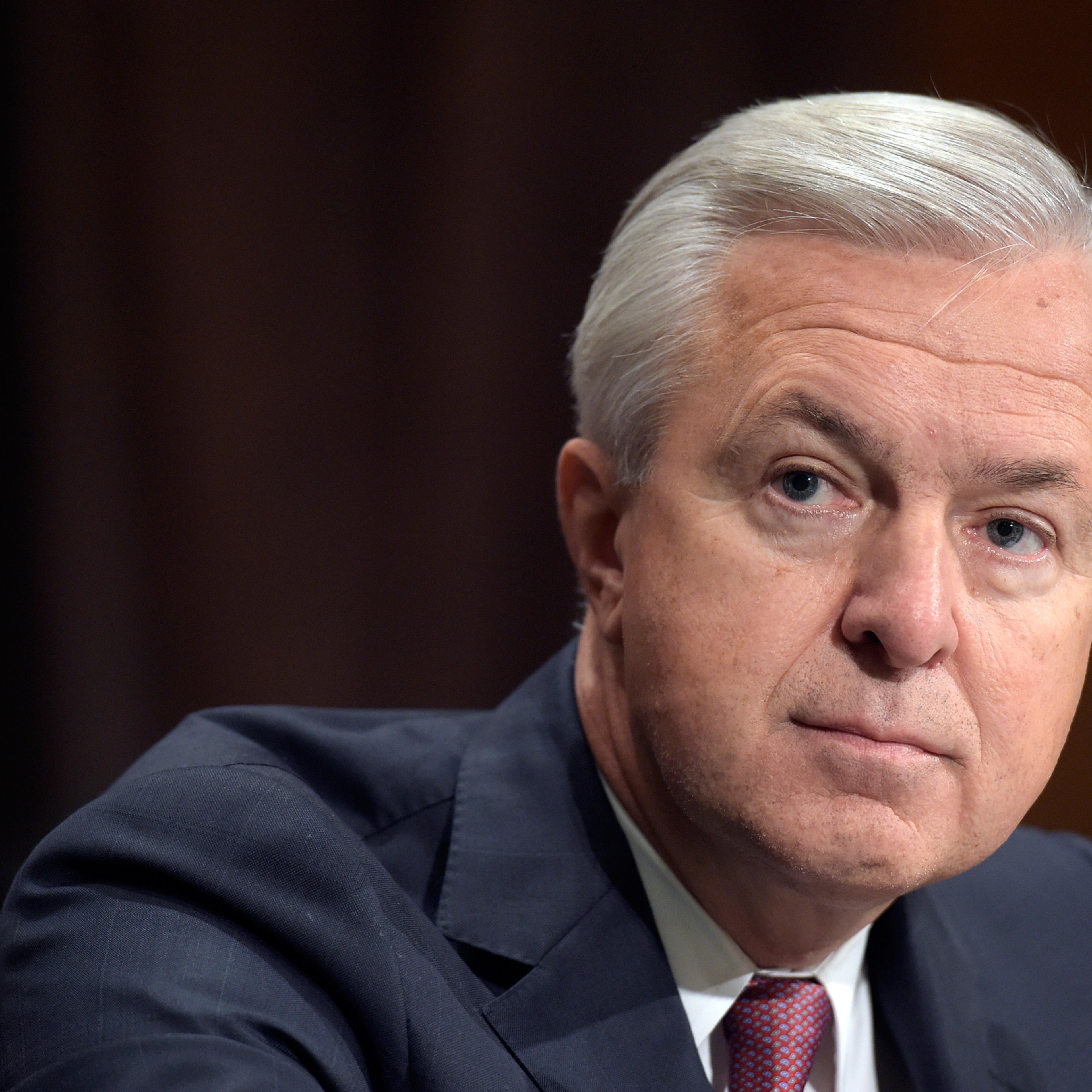 In this Tuesday, Sept. 20, 2016, photo, Wells Fargo CEO John Stumpf testifies on Capitol Hill in Washington, before the Senate Banking Committee. The San Francisco Fed said Thursday, Sept. 22, 2016, that Stumpf is resigning his position on the Federal Re