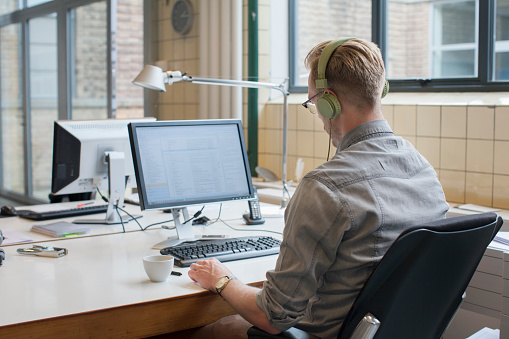 businessman-working-headphones