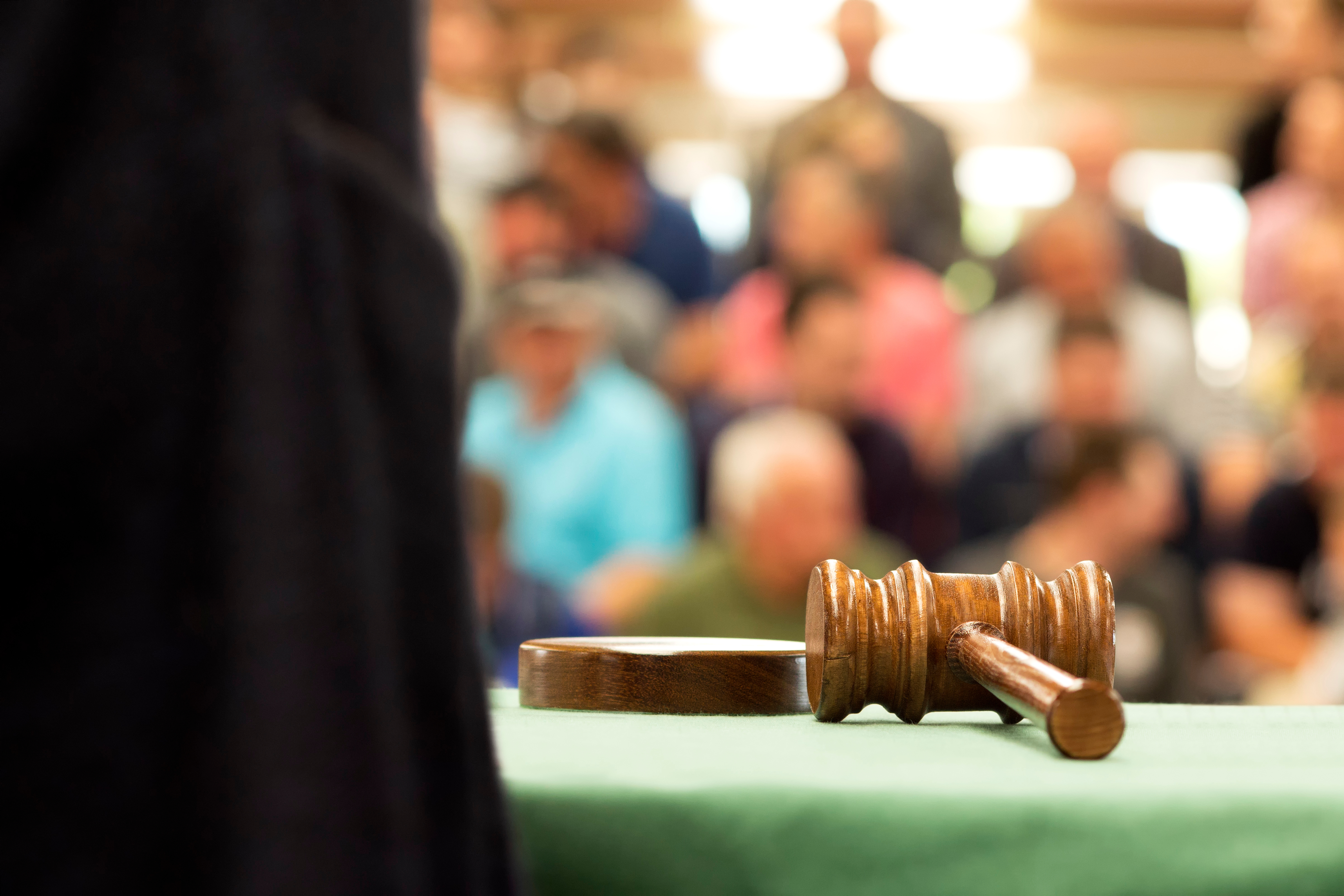 Close-Up Of Gavel On Table