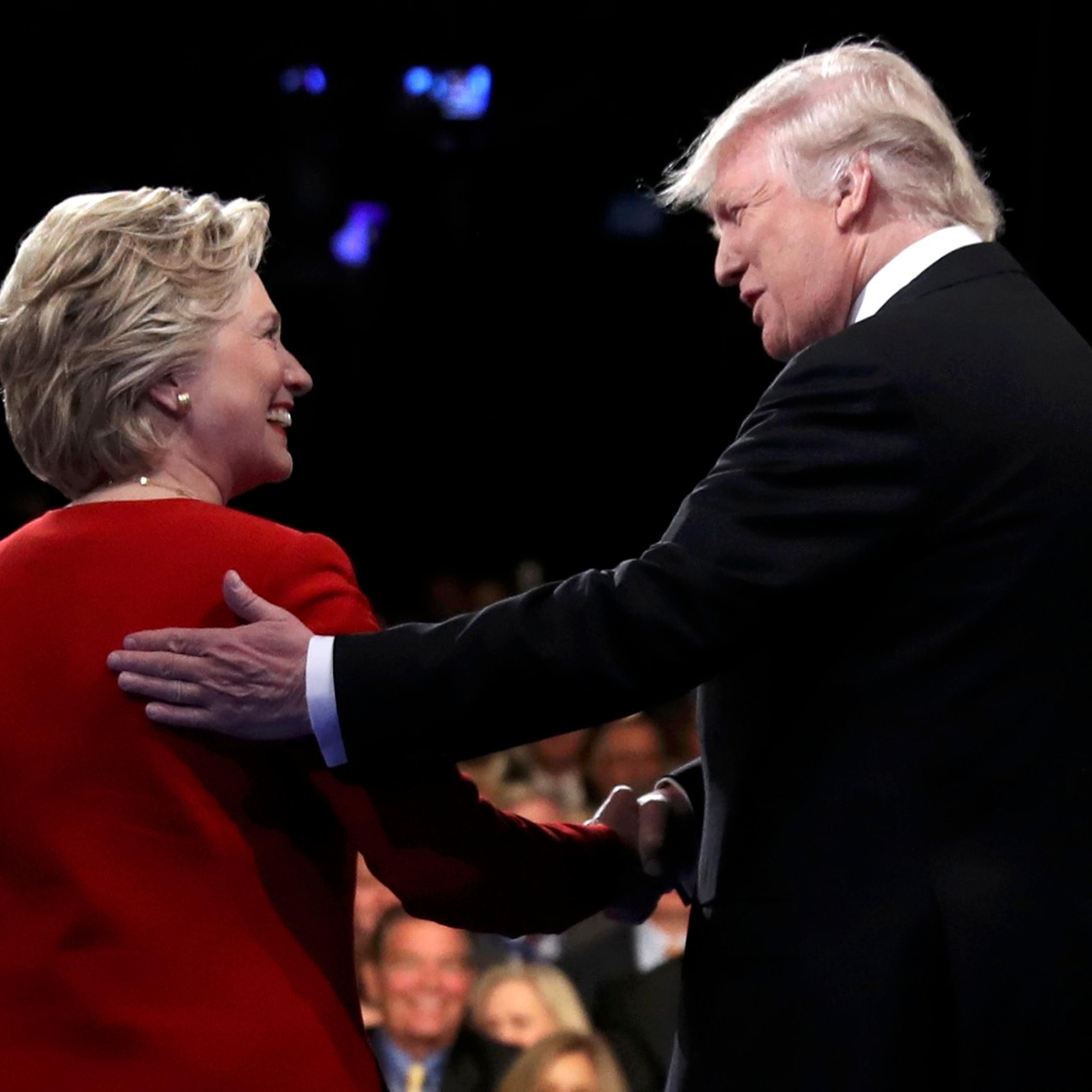 Republican U.S. presidential nominee Donald Trump shakes hands with Democratic U.S. presidential nominee Hillary Clinton at the start of their first presidential debate at Hofstra University in Hempstead