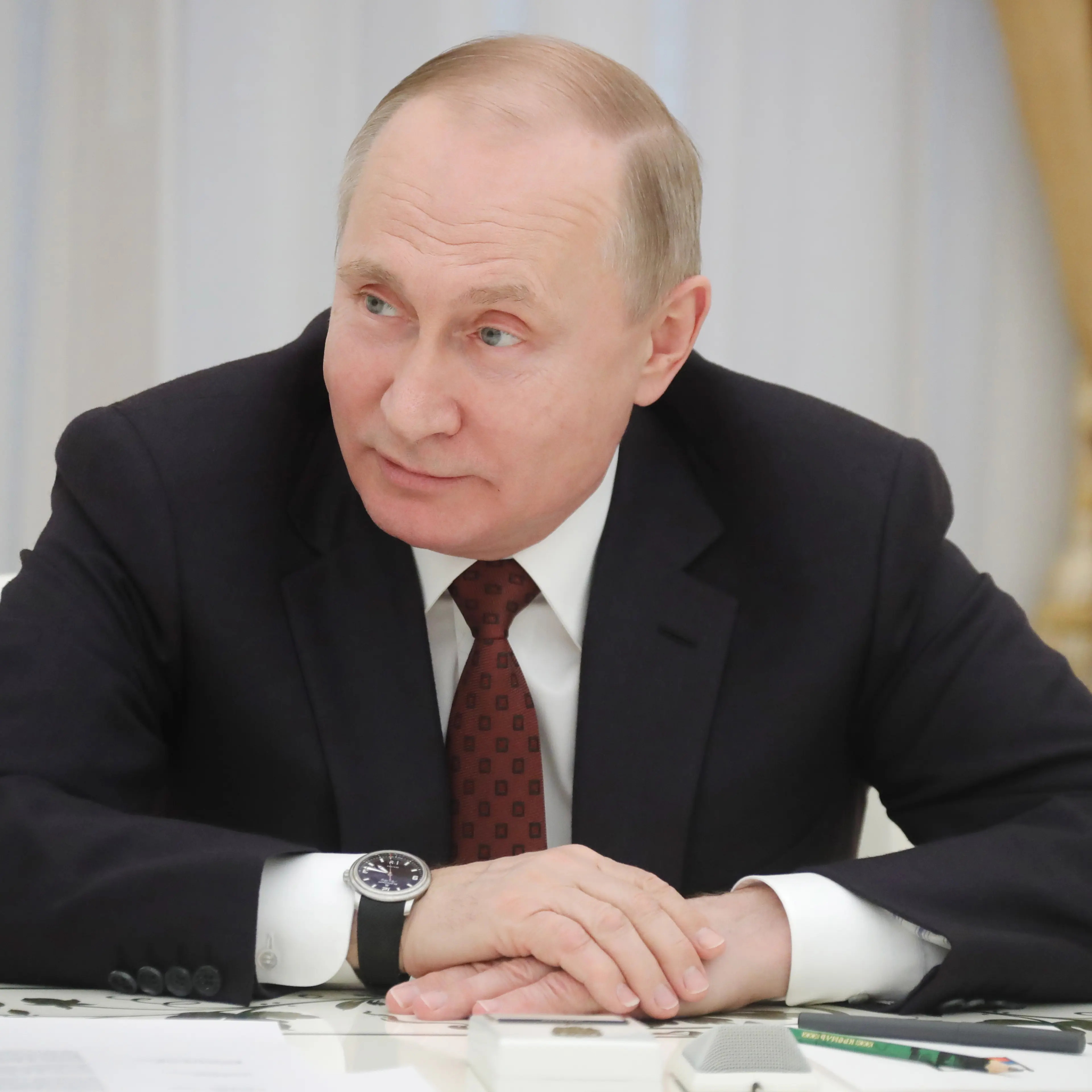 Russian President Putin meets with presidential candidates in Moscow