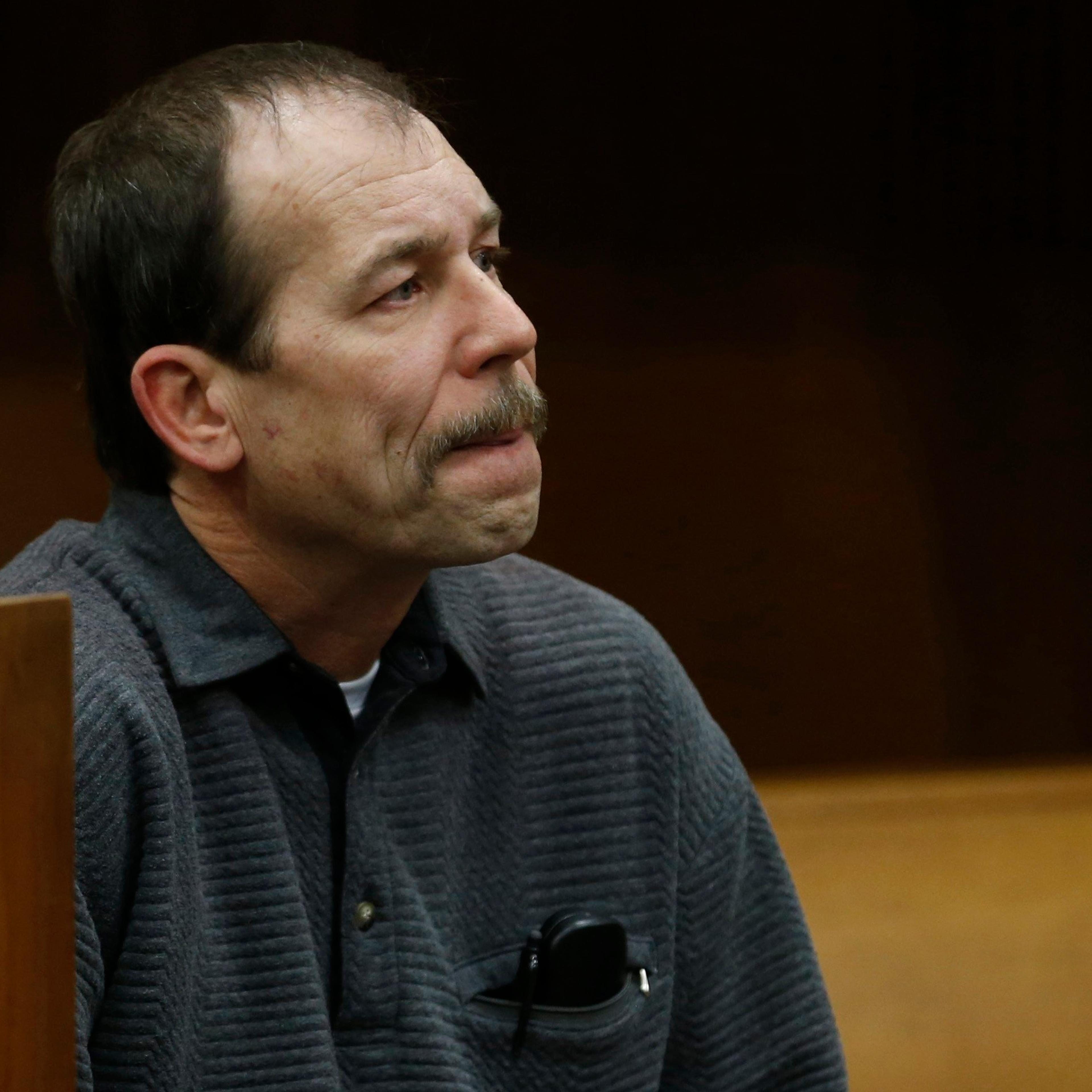 Theodore Wafer sits in the court room during his arraignment in Detroit, Michigan on January 15, 2014.