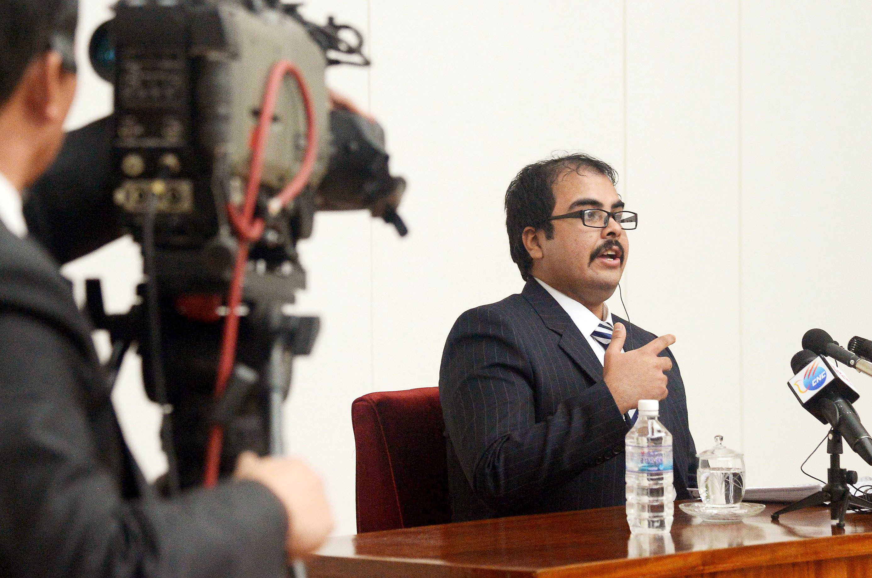 A man who identifies himself as Arturo Pierre Martine, a 29-year-old American raised in El Paso, Texas speaks at a press conference in North Korea's capital Pyongyang on Dec. 14, 2014.
