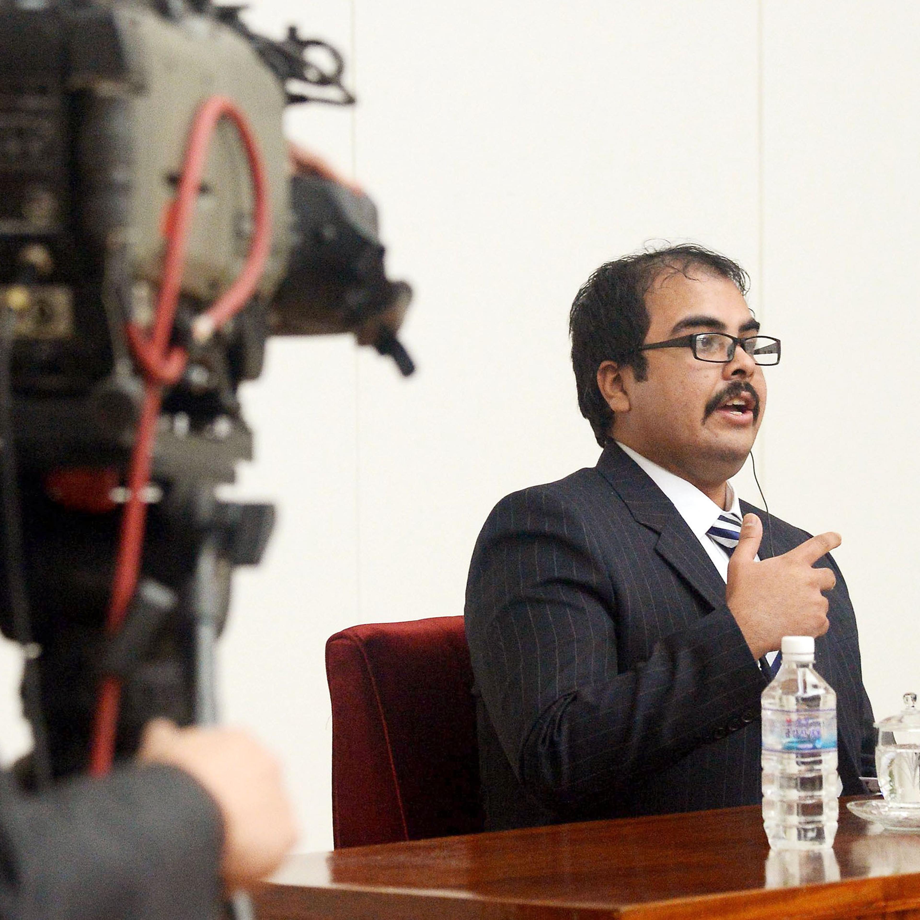 A man who identifies himself as Arturo Pierre Martine, a 29-year-old American raised in El Paso, Texas speaks at a press conference in North Korea's capital Pyongyang on Dec. 14, 2014.