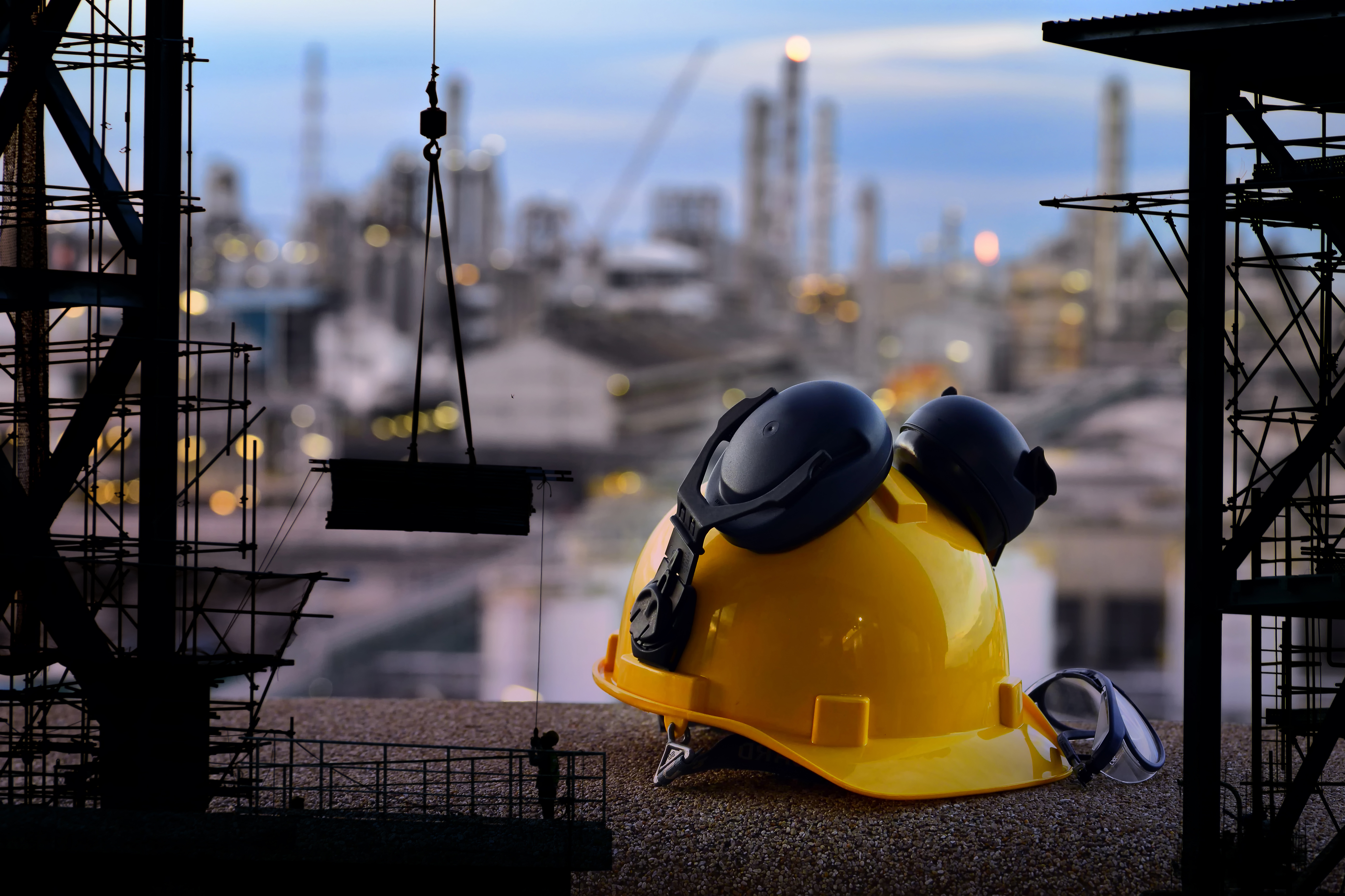 Set of safety work wear on  construction background ,Work safety at construction site concept .